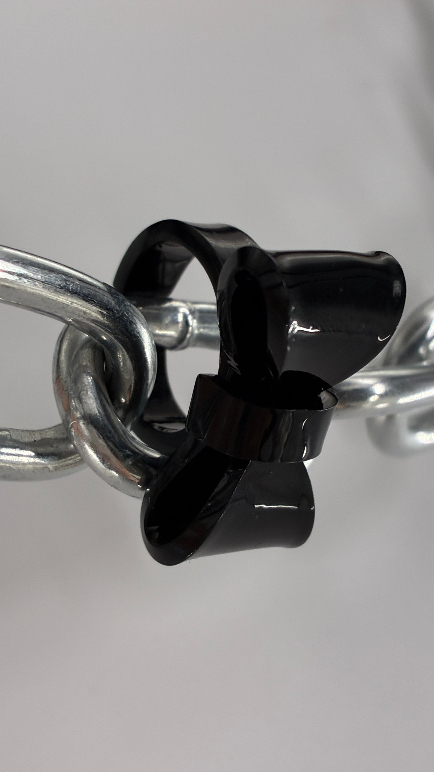 Black Plastic Adjustable Bow Ring