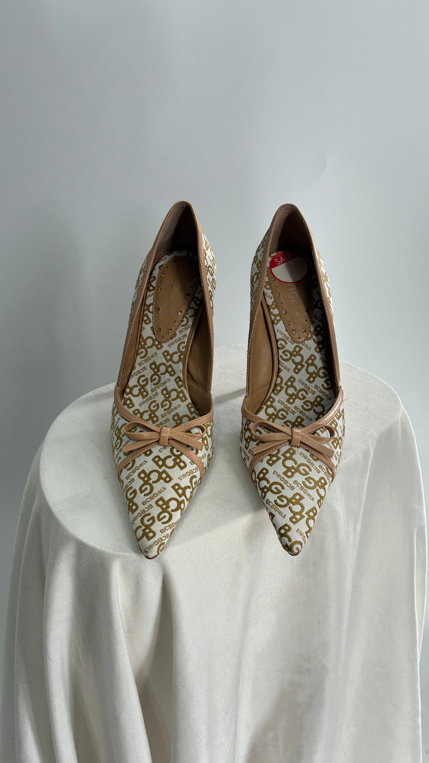 Vintage BCBG All Over Monogram Pointed Toe Heels with Leather Bows and Piping (5.5)