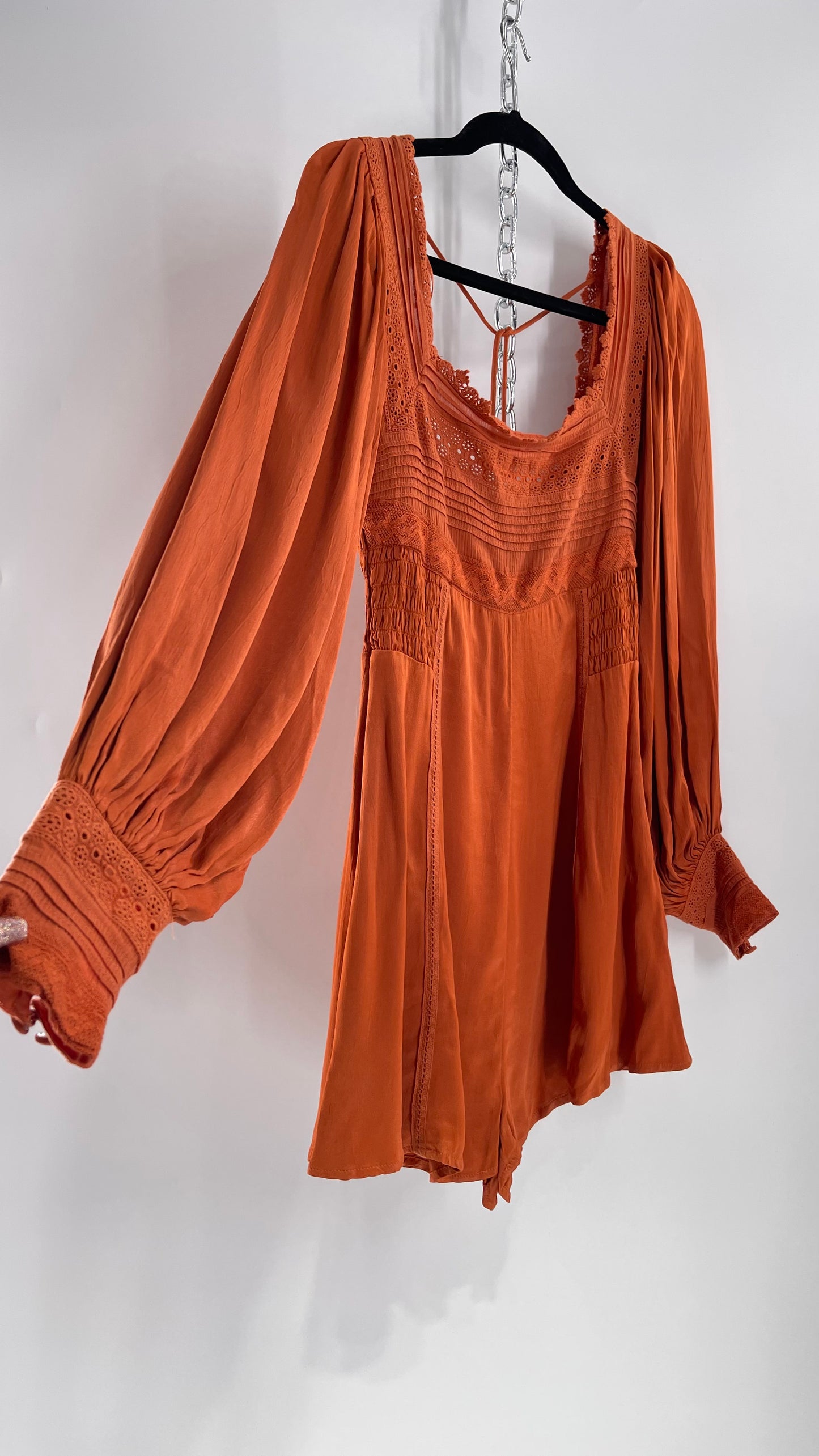 Free People Silky Orange Romper with Buttoned Sleeve Cuffs, Balloon Sleeves and Pleated Lace Bust (2)