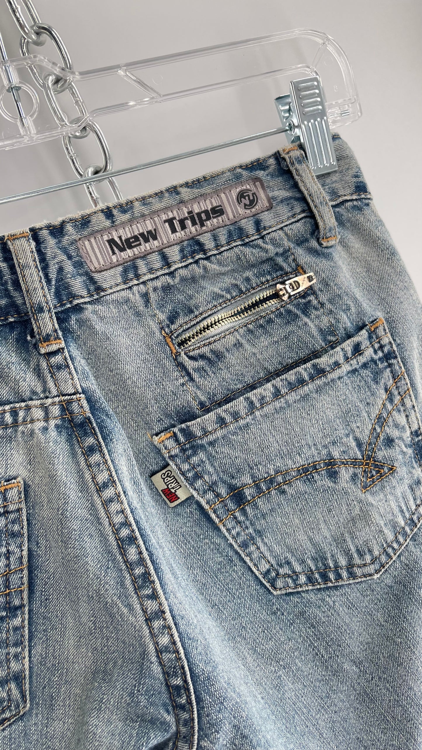 Vintage New Trips Light Wash Kick Flare Jeans with Zipper Hem Detail, V Waistline and Oversized Metal Buttons (40)