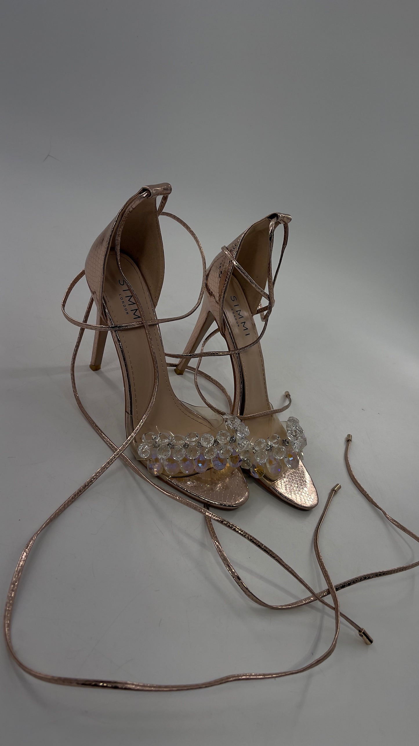 SIMMI LONDON Rose Gold Textured Heels with Clear Toe Strap Covered in Rhinestones/ Crystal Pendants and Tie Up Ankle Straps (7)