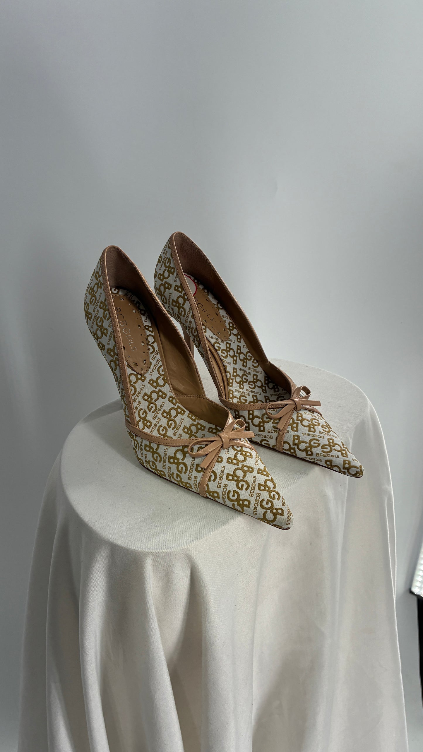 Vintage BCBG All Over Monogram Pointed Toe Heels with Leather Bows and Piping (5.5)