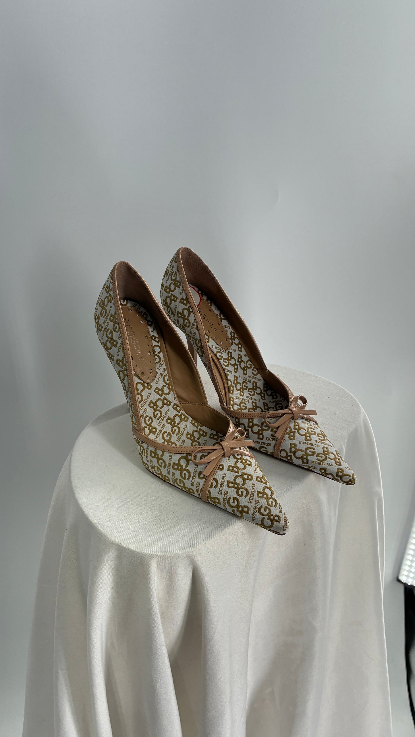 Vintage BCBG All Over Monogram Pointed Toe Heels with Leather Bows and Piping (5.5)