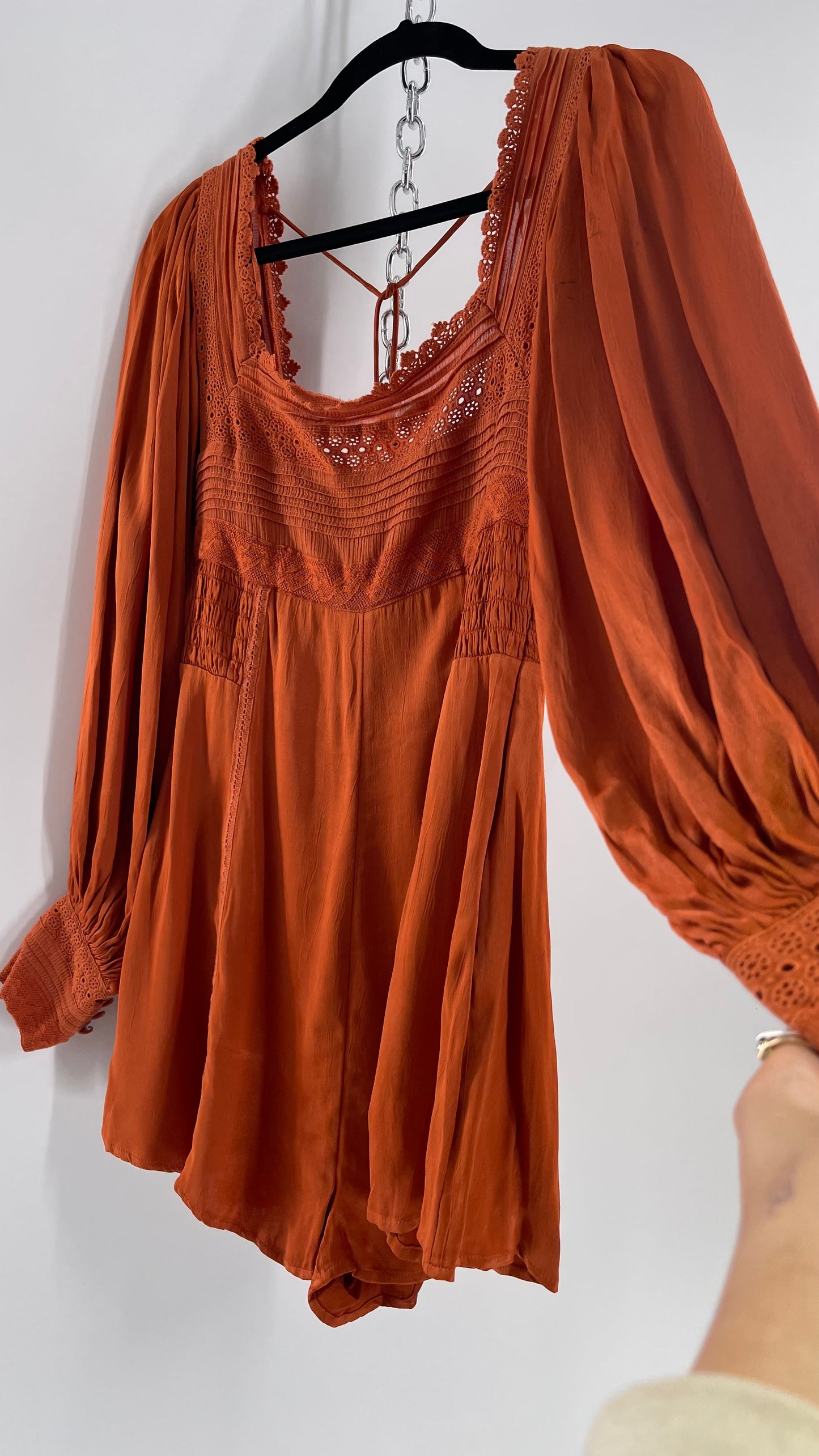 Free People Silky Orange Romper with Buttoned Sleeve Cuffs, Balloon Sleeves and Pleated Lace Bust (2)