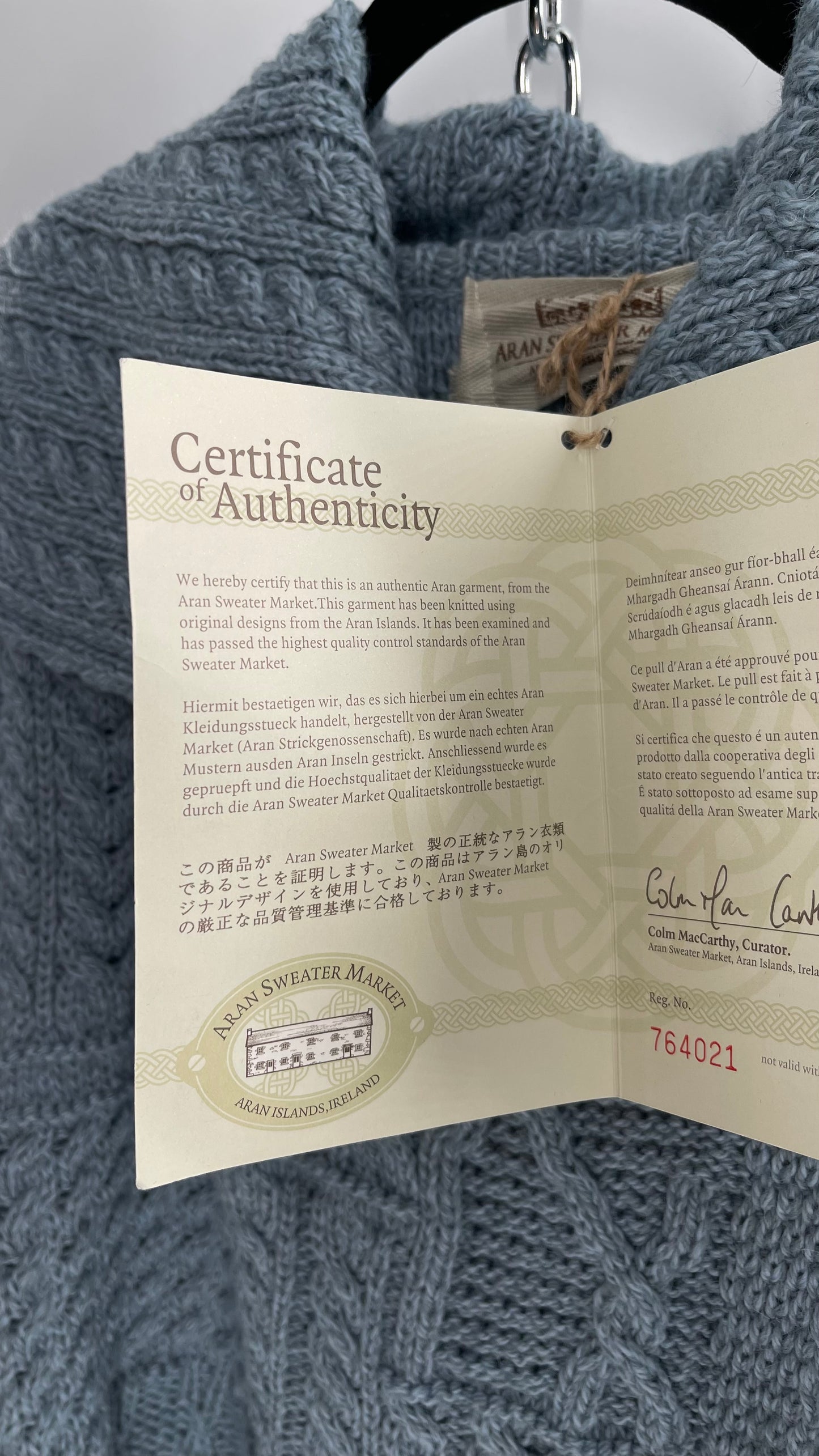 Authentic Irish Aran Sweater Market Slate Blue Aran Stitch Sweater with Oversized Wooden Button Detail and Certificate of Authenticity (Small)