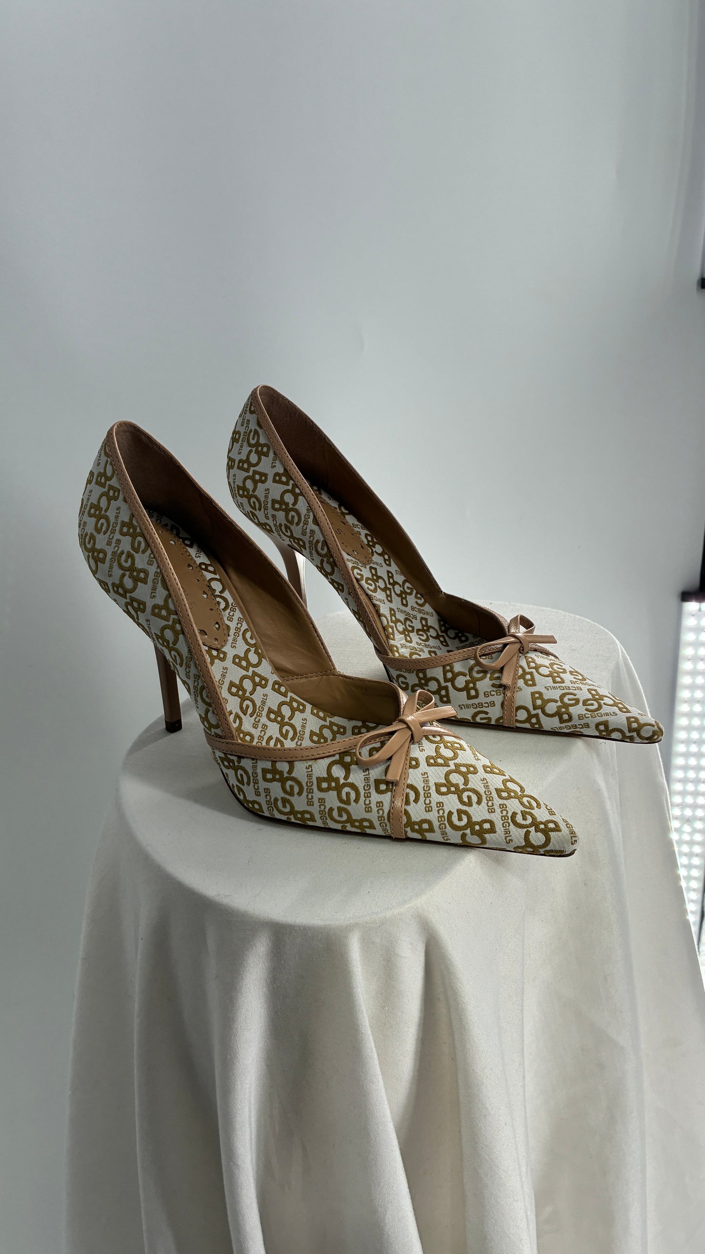 Vintage BCBG All Over Monogram Pointed Toe Heels with Leather Bows and Piping (5.5)
