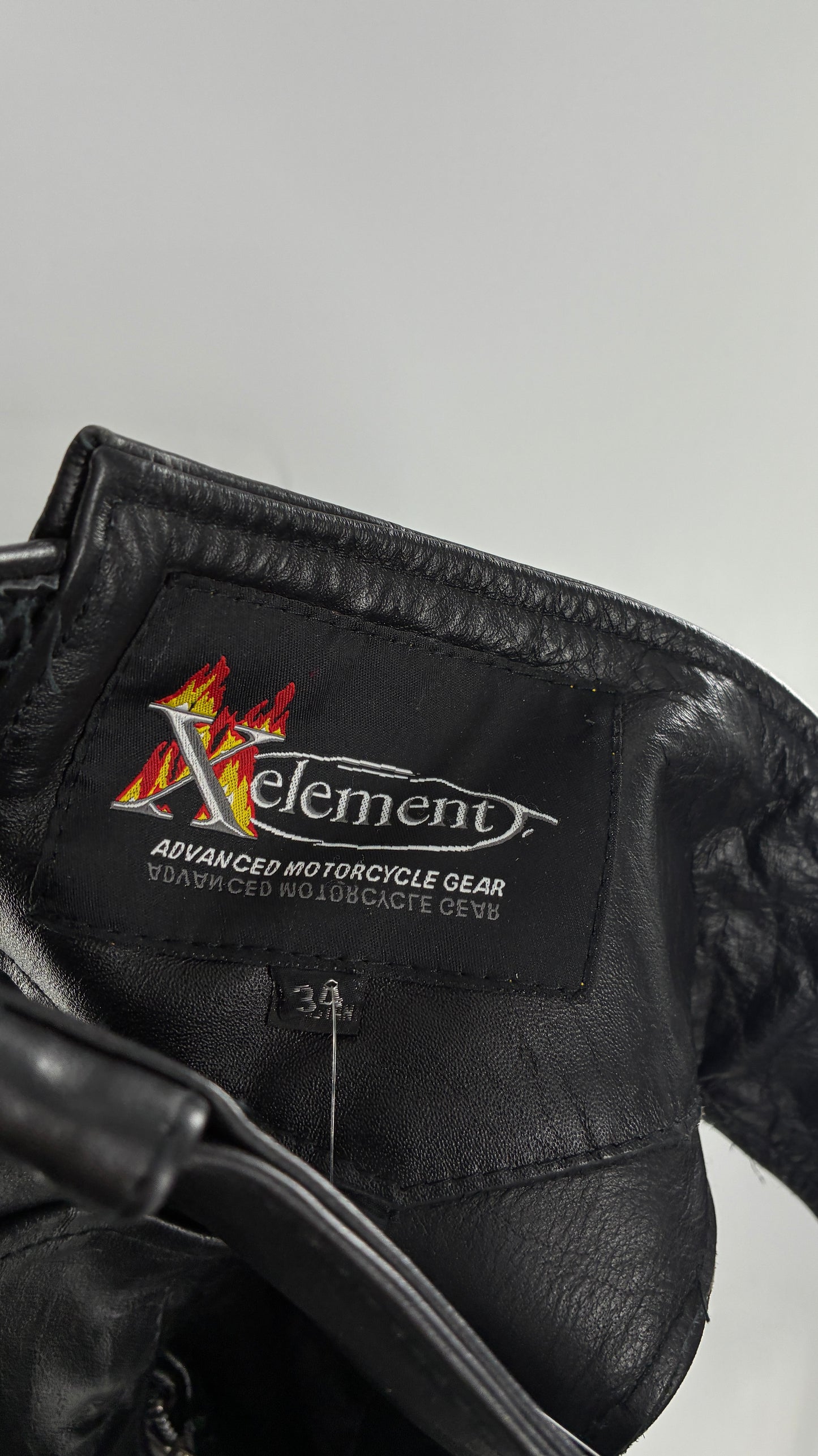 Vintage Xelement Black Genuine Leather Motorcycle Chaps with Side Zipper and Button Closure (34)