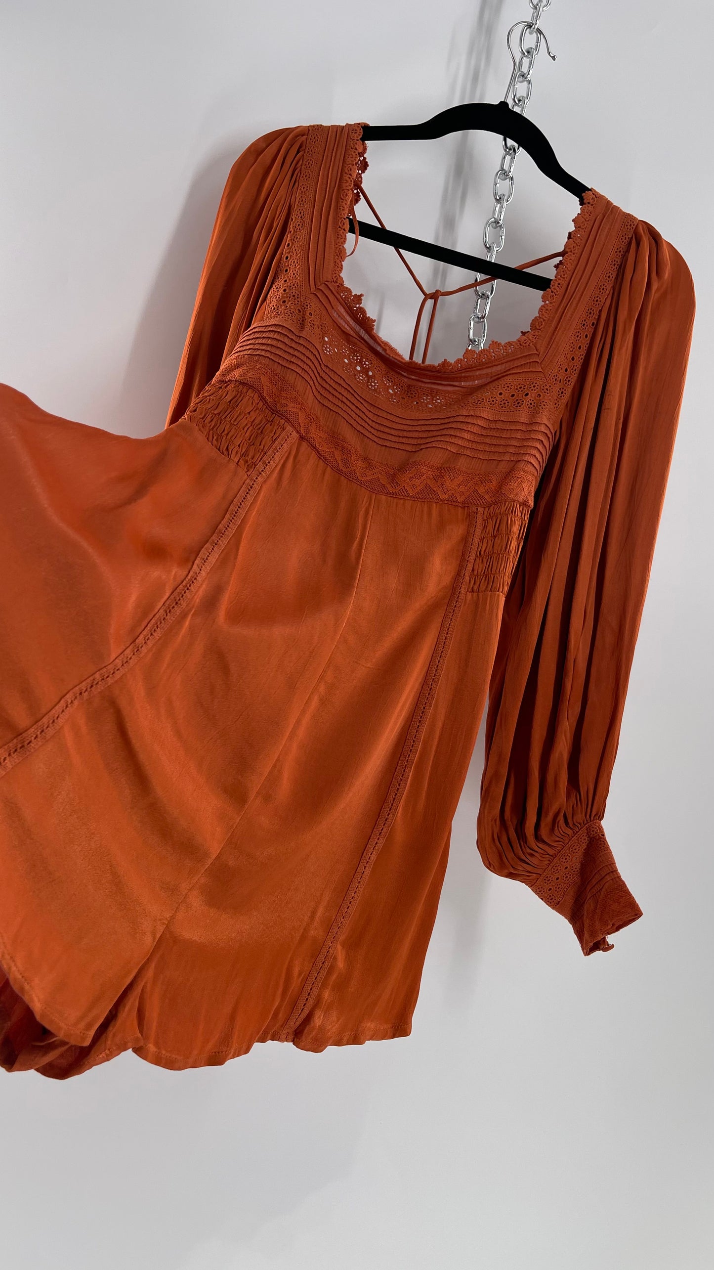 Free People Silky Orange Romper with Buttoned Sleeve Cuffs, Balloon Sleeves and Pleated Lace Bust (2)