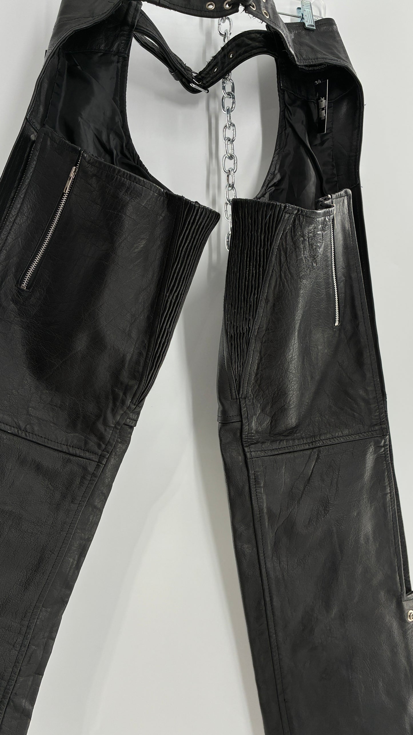 Vintage Xelement Black Genuine Leather Motorcycle Chaps with Side Zipper and Button Closure (34)