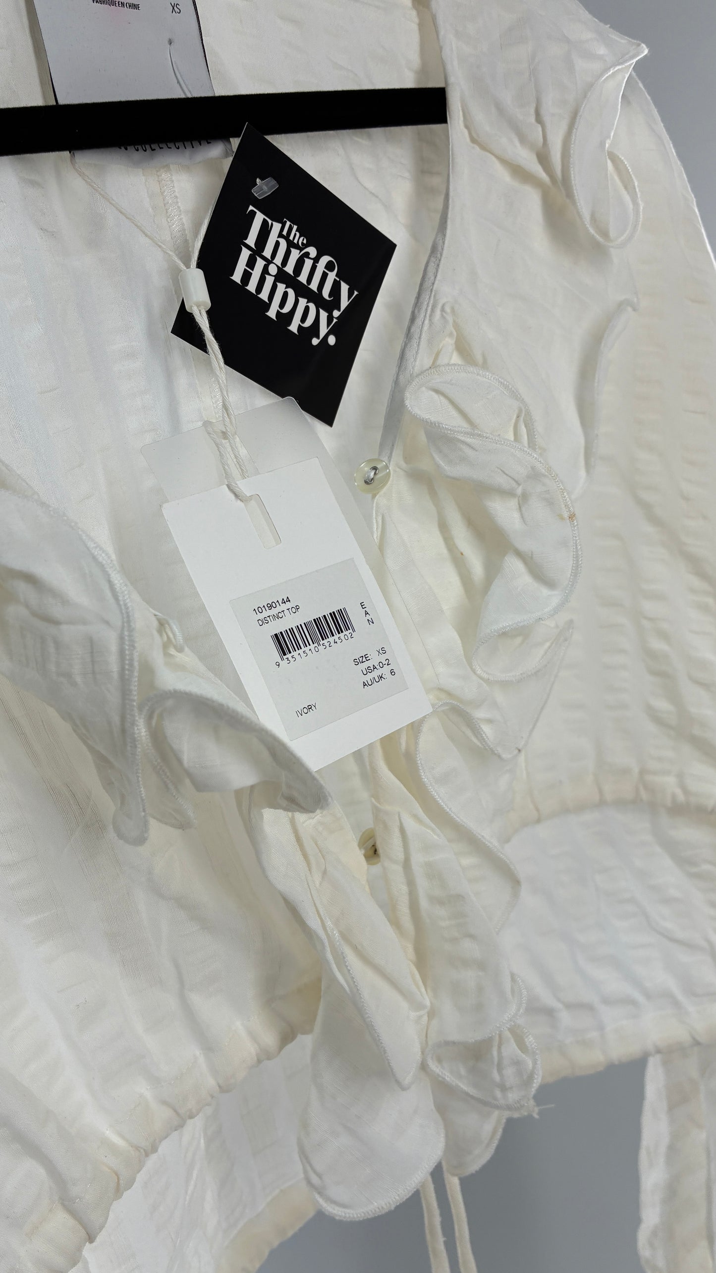 CMEO Collective White Balloon Sleeve Blouse with Ruffled, Button Up Neckline and Adjustable Drawstring Waist (XS 0-2)