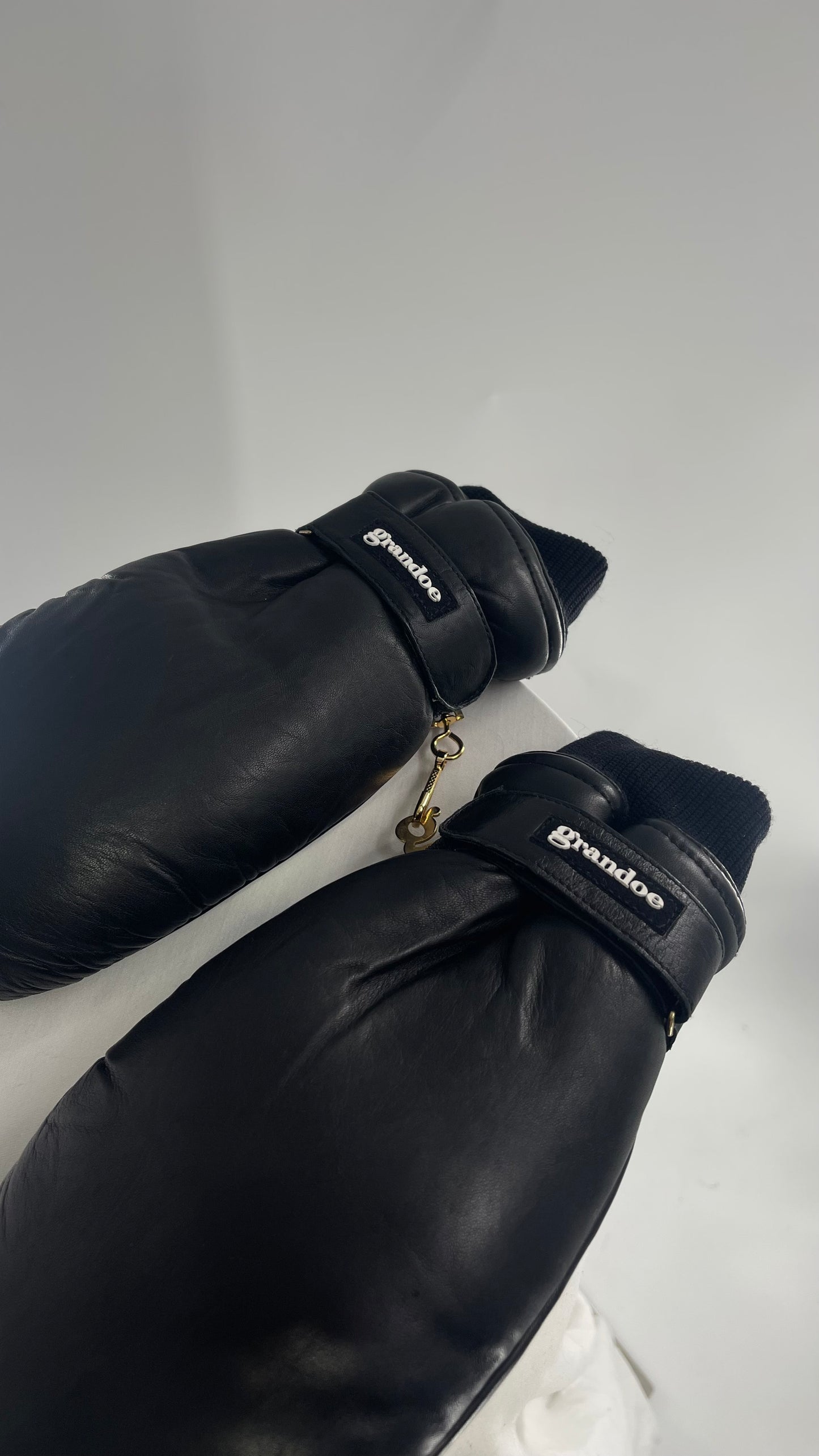 Grandoe Black Leather Mittens with Branding and Gold Logo Link