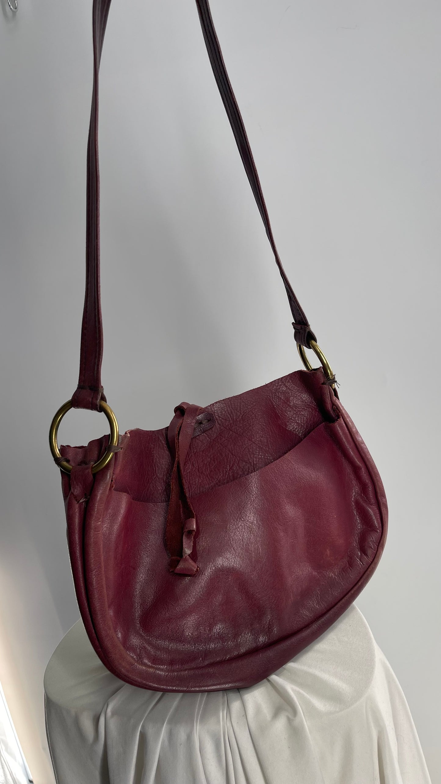 Vintage Burgundy Leather Saddle Bag with Gold Hardware