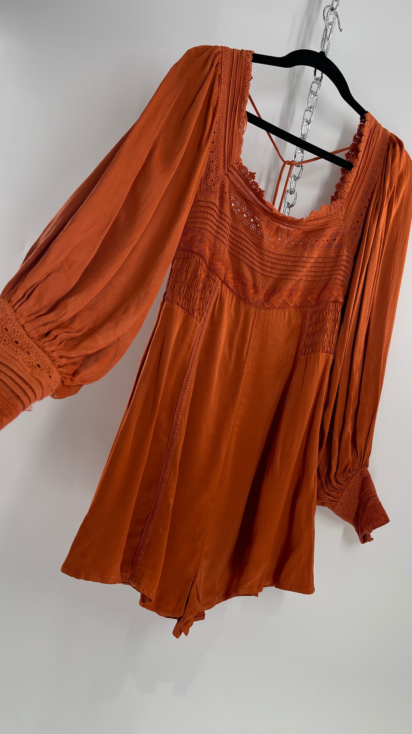 Free People Silky Orange Romper with Buttoned Sleeve Cuffs, Balloon Sleeves and Pleated Lace Bust (2)