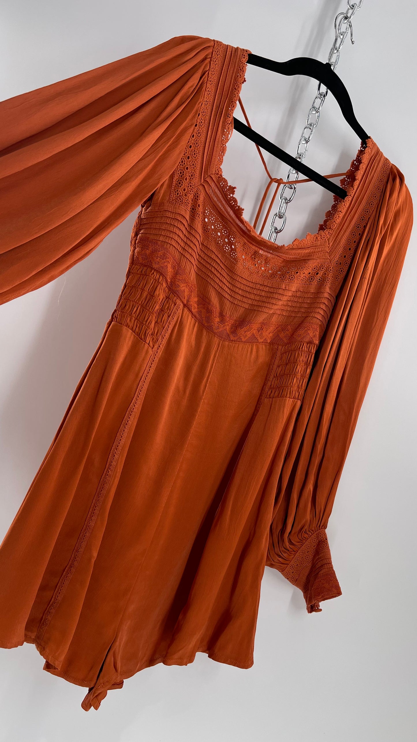 Free People Silky Orange Romper with Buttoned Sleeve Cuffs, Balloon Sleeves and Pleated Lace Bust (2)