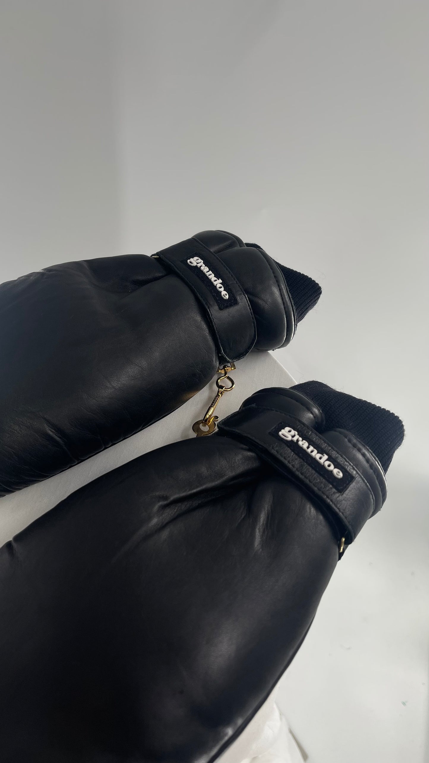 Grandoe Black Leather Mittens with Branding and Gold Logo Link