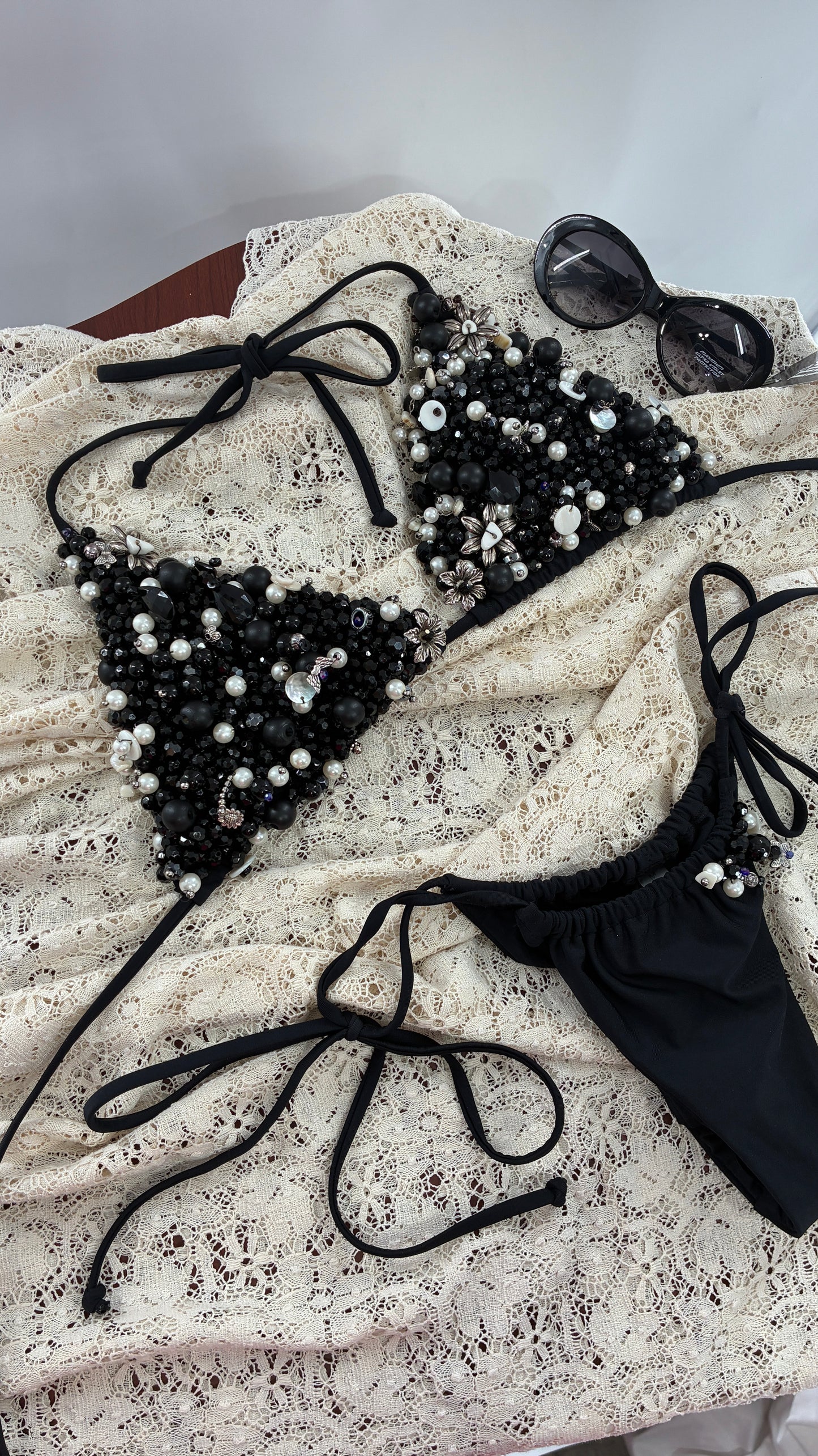 CUSTOM 1/1 Black Swimsuit Covered in Hand Placed and Sewn Beads, Charms, and Gems (MEDIUM)