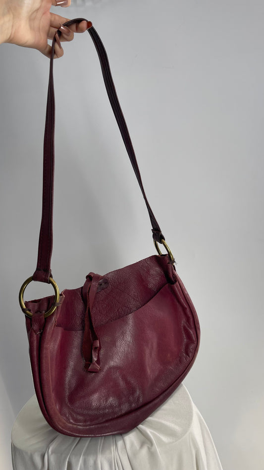 Vintage Burgundy Leather Saddle Bag with Gold Hardware