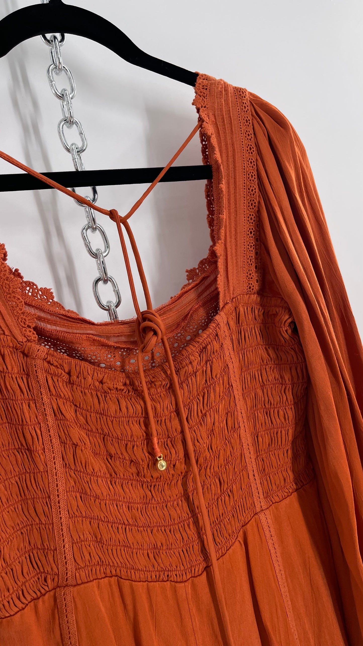 Free People Silky Orange Romper with Buttoned Sleeve Cuffs, Balloon Sleeves and Pleated Lace Bust (2)