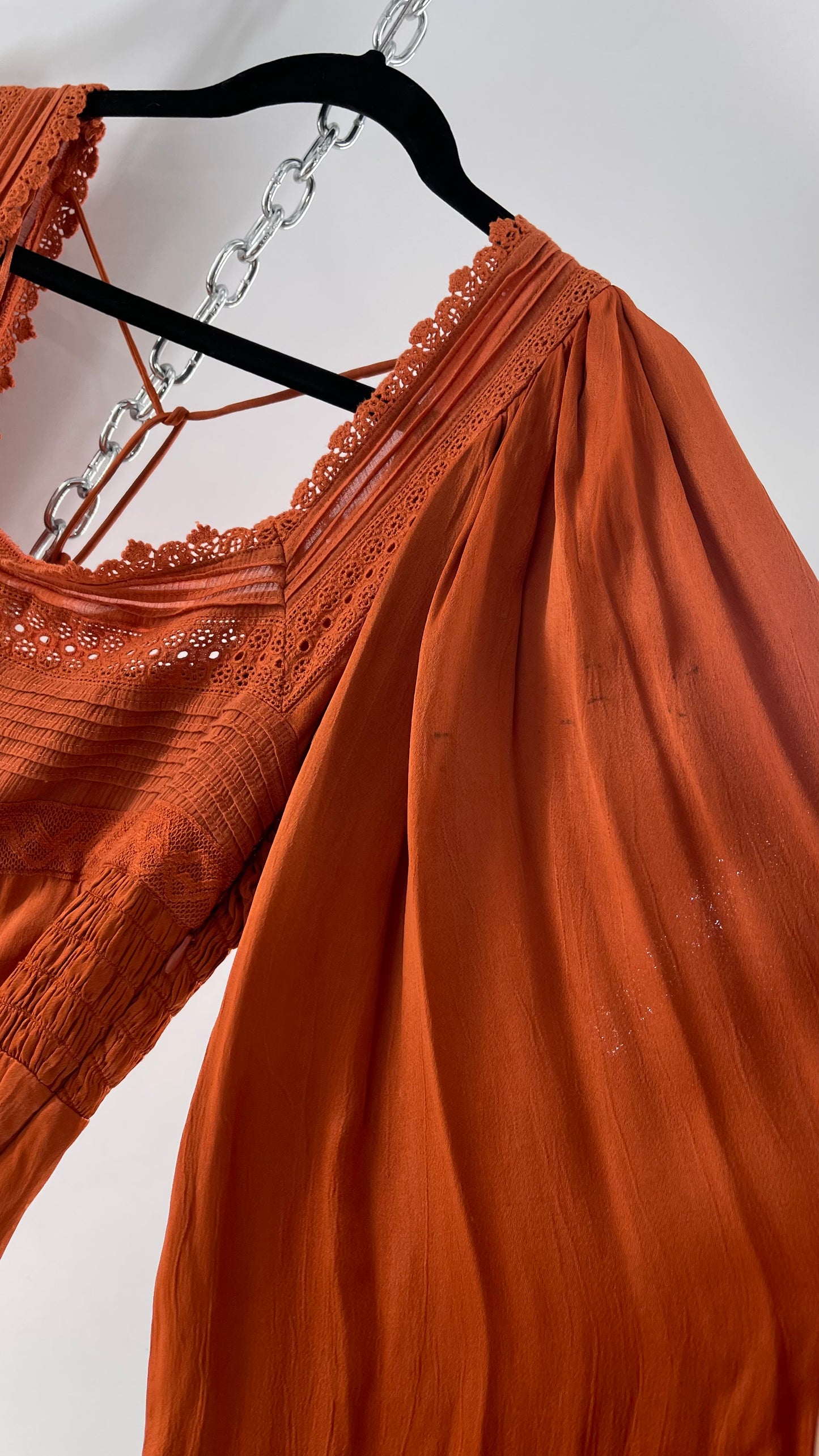 Free People Silky Orange Romper with Buttoned Sleeve Cuffs, Balloon Sleeves and Pleated Lace Bust (2)