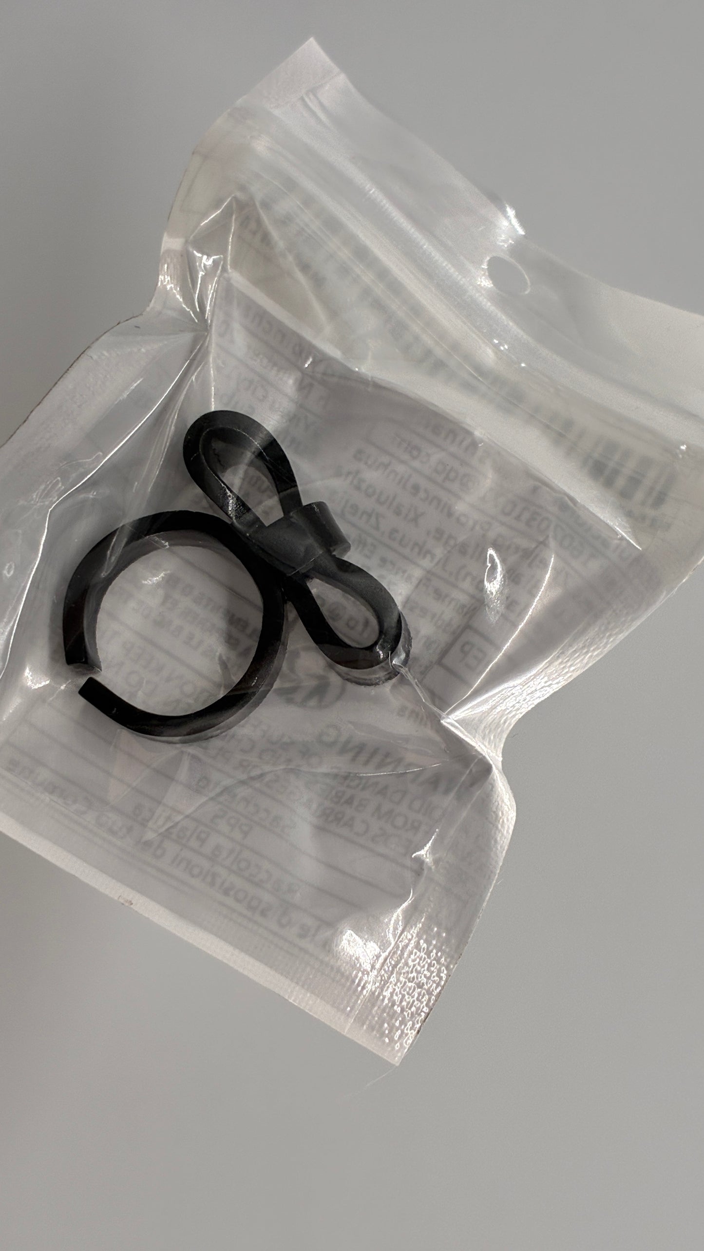 Black Plastic Adjustable Bow Ring
