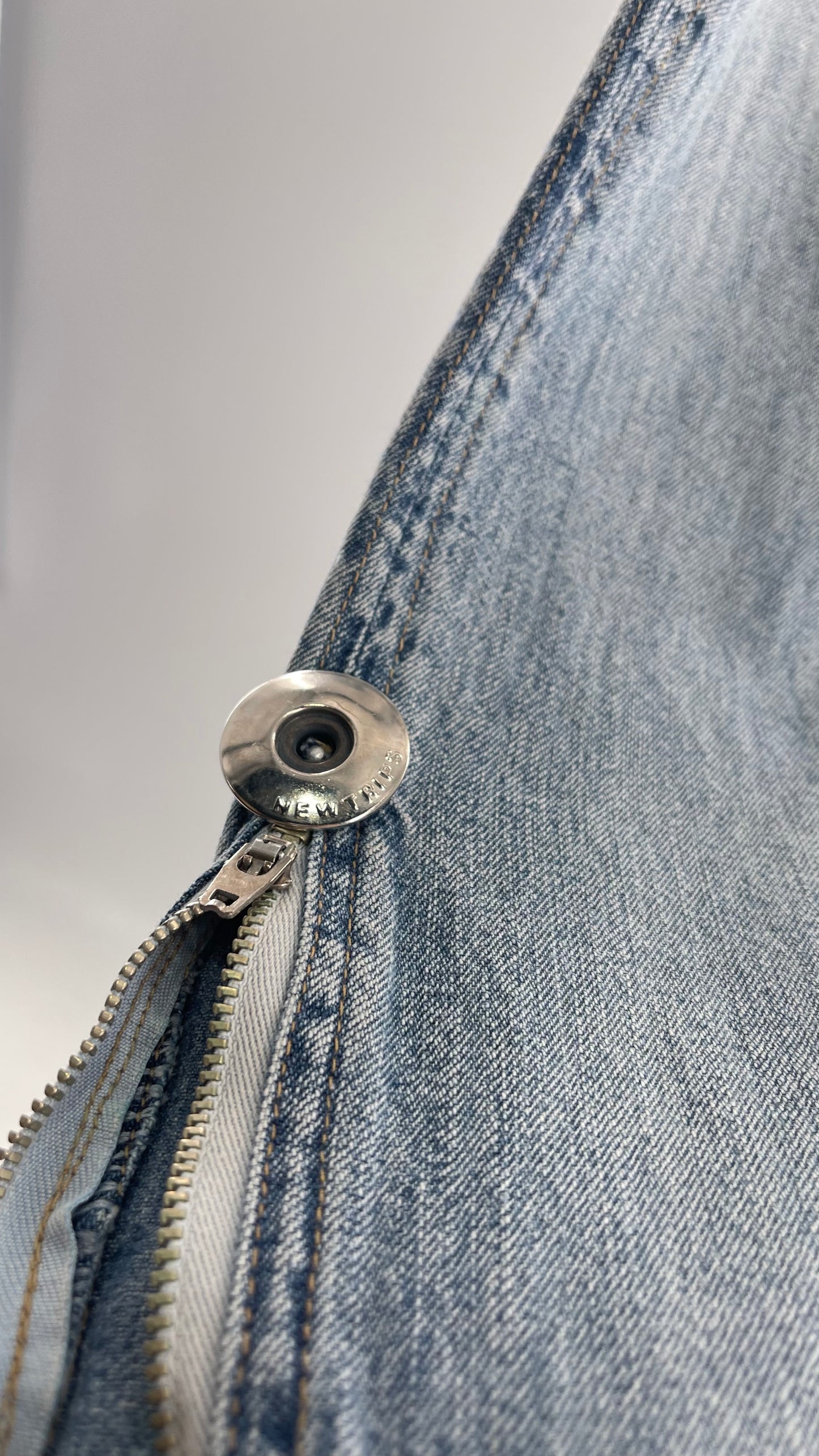 Vintage New Trips Light Wash Kick Flare Jeans with Zipper Hem Detail, V Waistline and Oversized Metal Buttons (40)