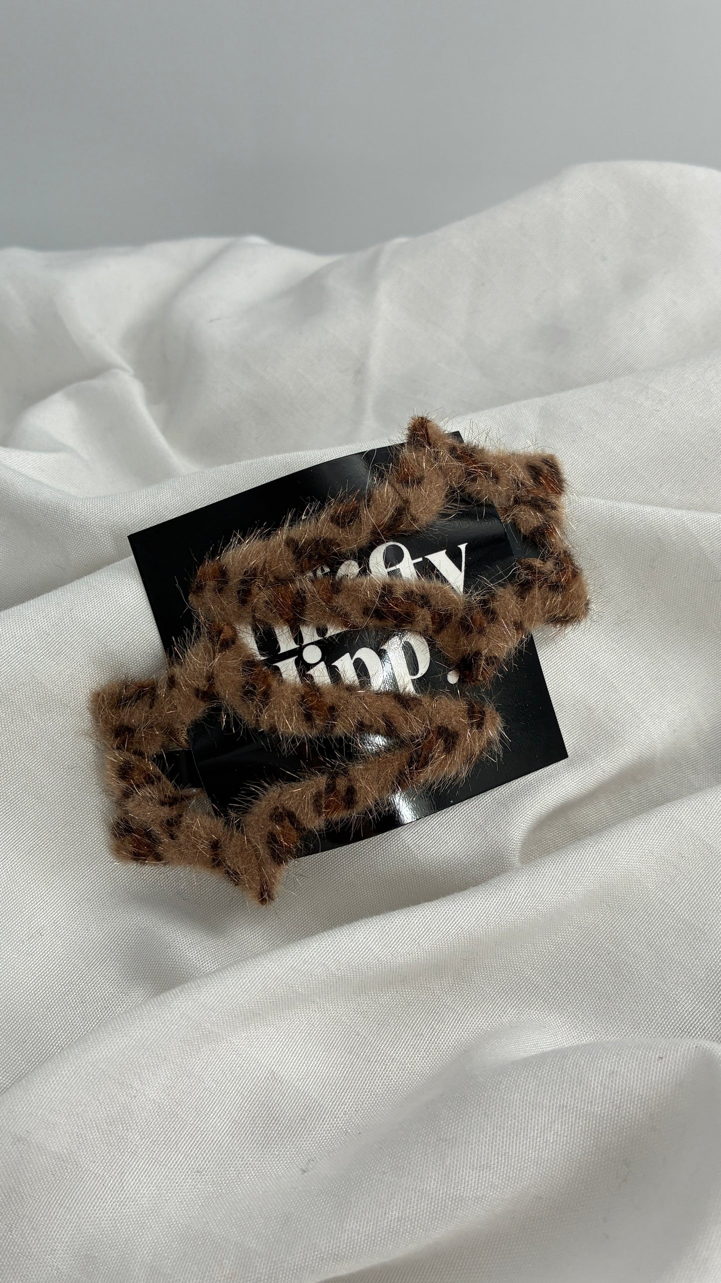 Fuzzy Cheetah Printed Shooting Star Hair Clips