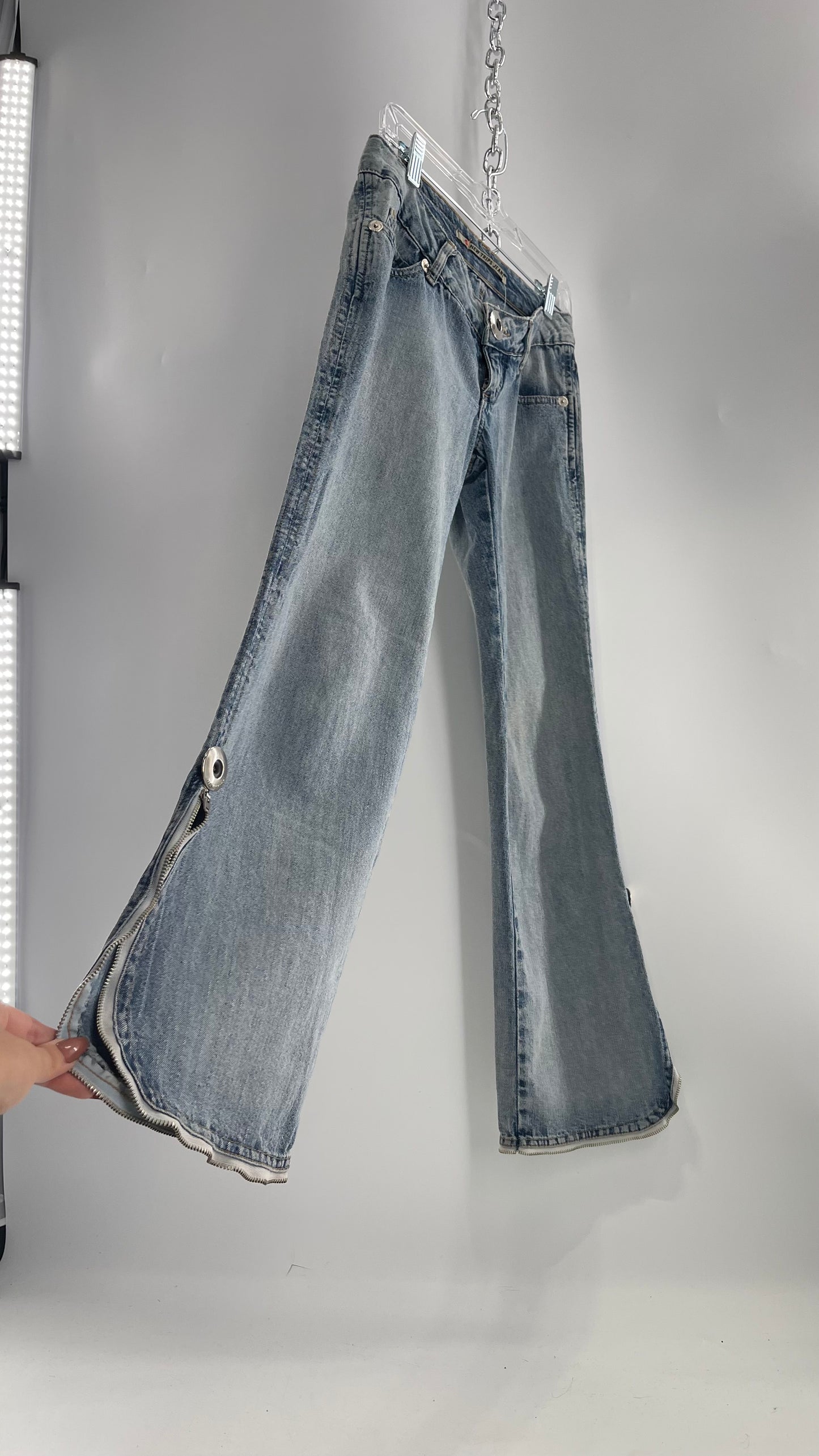 Vintage New Trips Light Wash Kick Flare Jeans with Zipper Hem Detail, V Waistline and Oversized Metal Buttons (40)