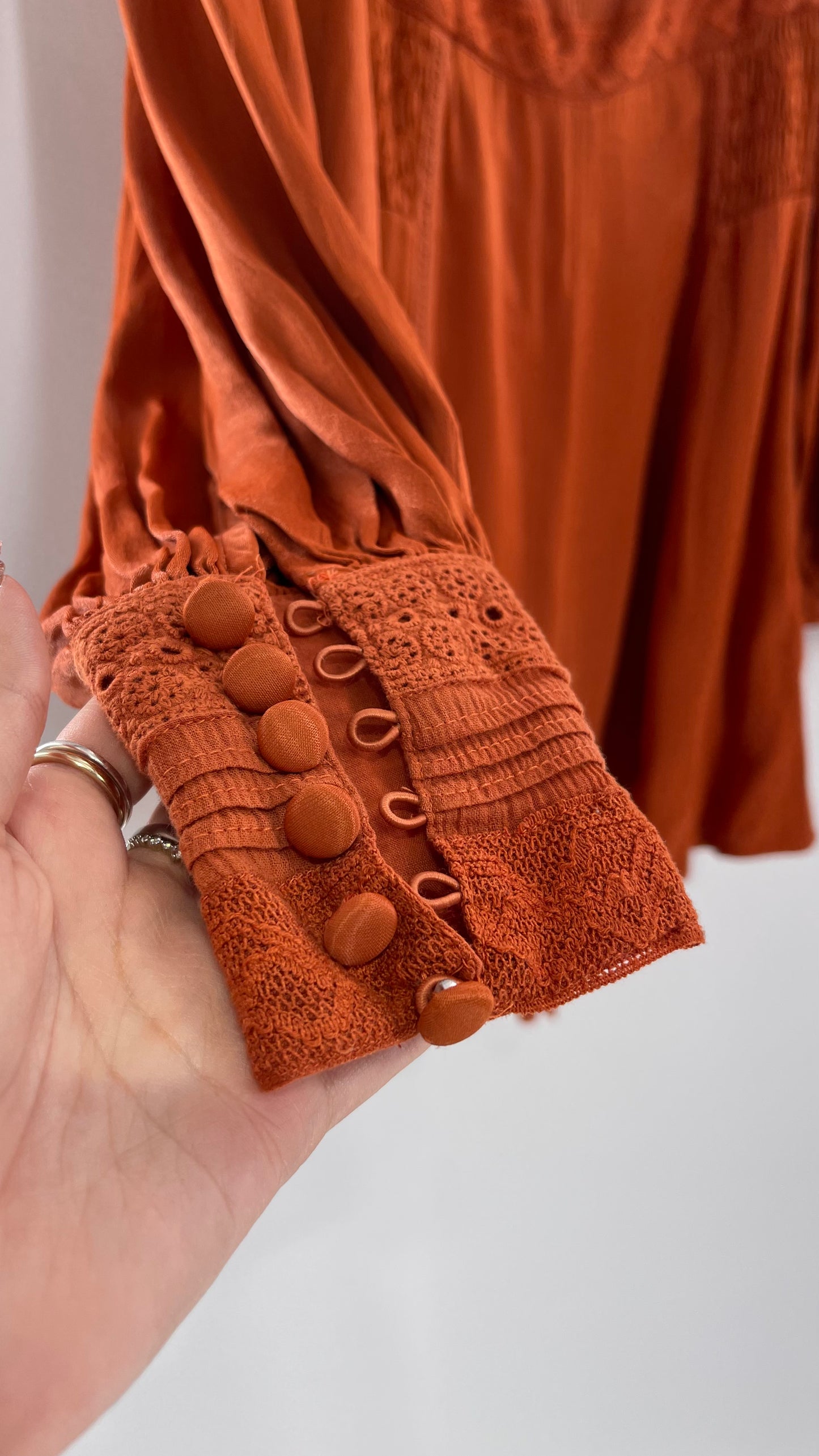 Free People Silky Orange Romper with Buttoned Sleeve Cuffs, Balloon Sleeves and Pleated Lace Bust (2)
