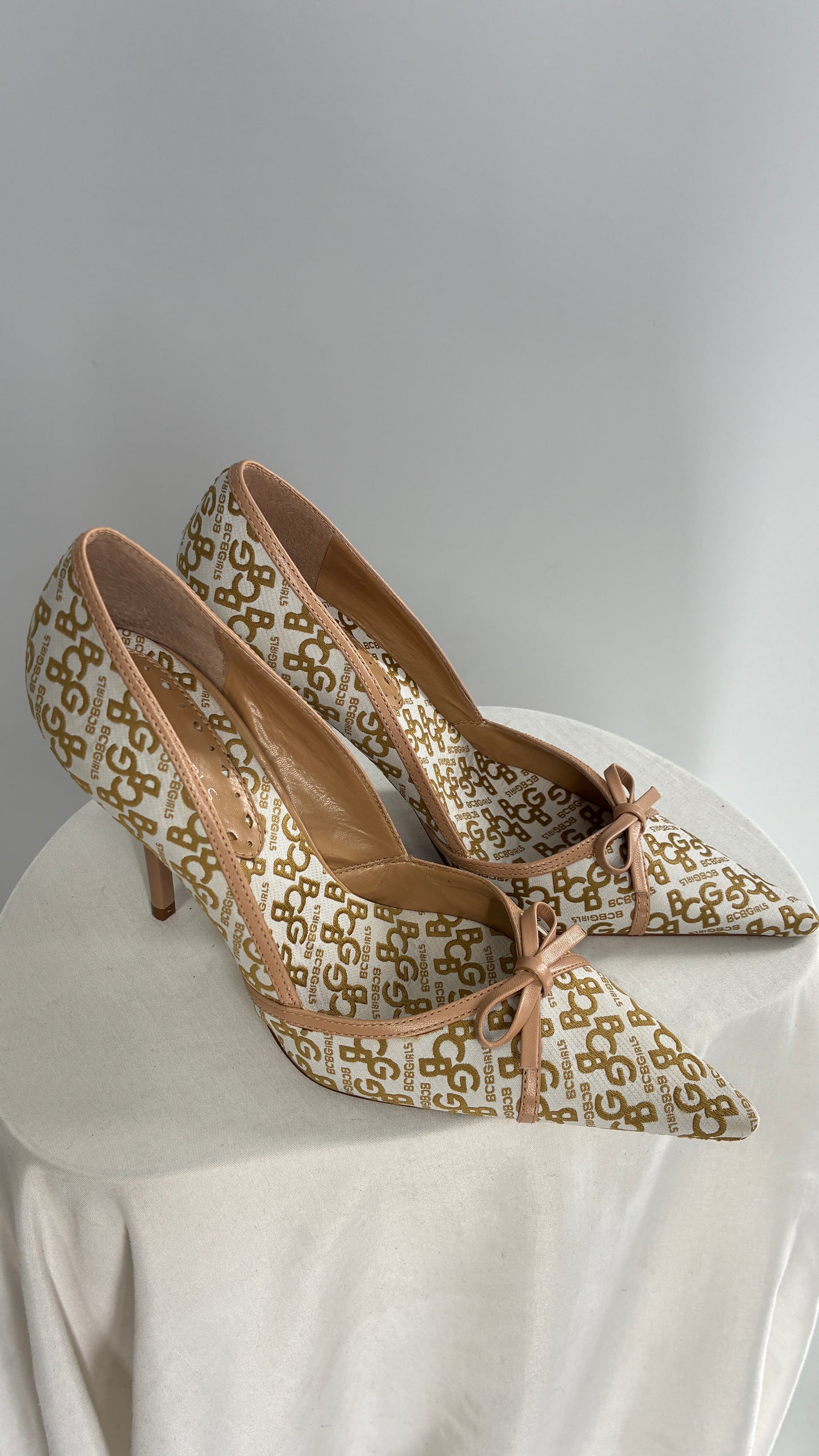 Vintage BCBG All Over Monogram Pointed Toe Heels with Leather Bows and Piping (5.5)