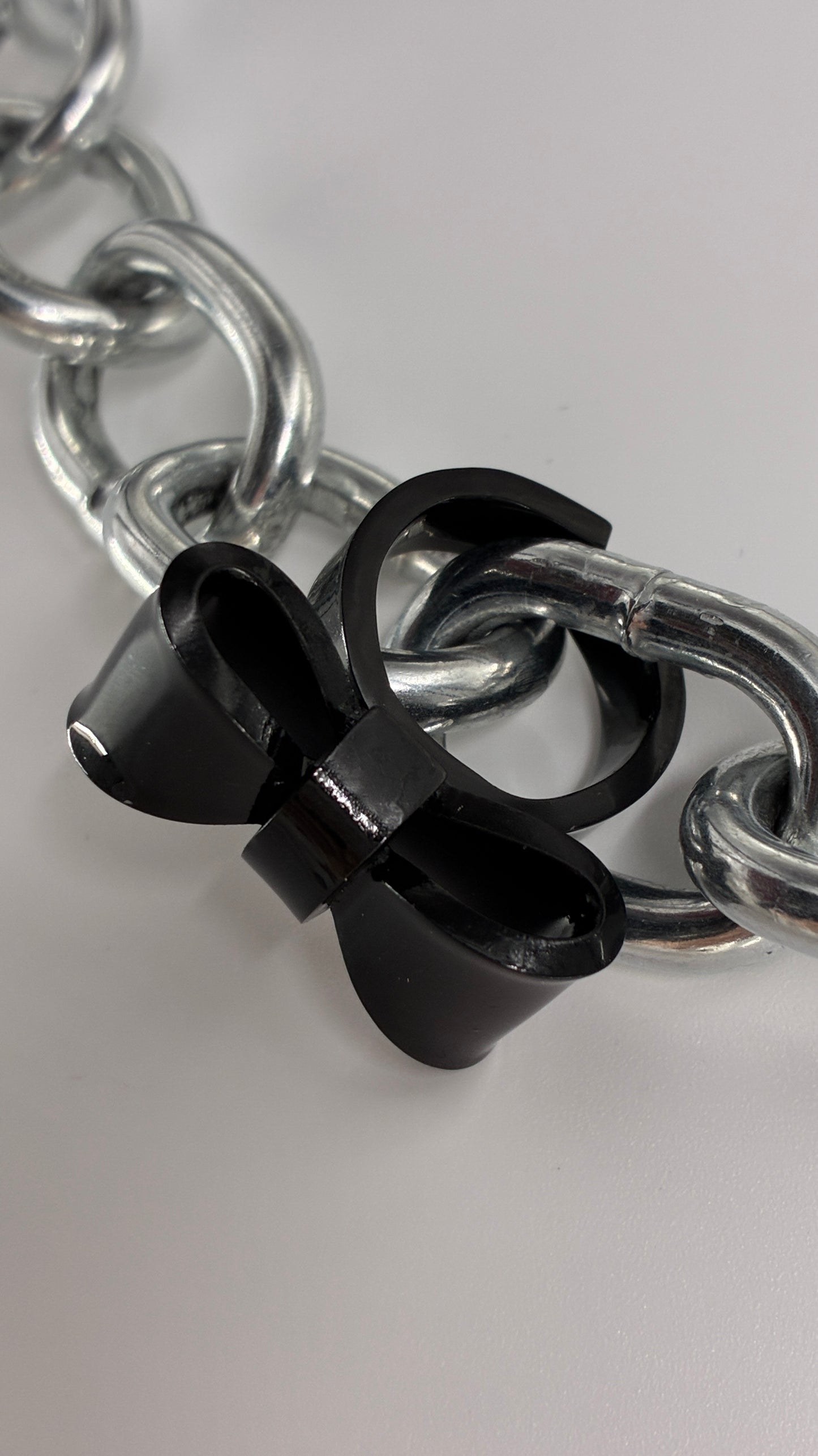 Black Plastic Adjustable Bow Ring