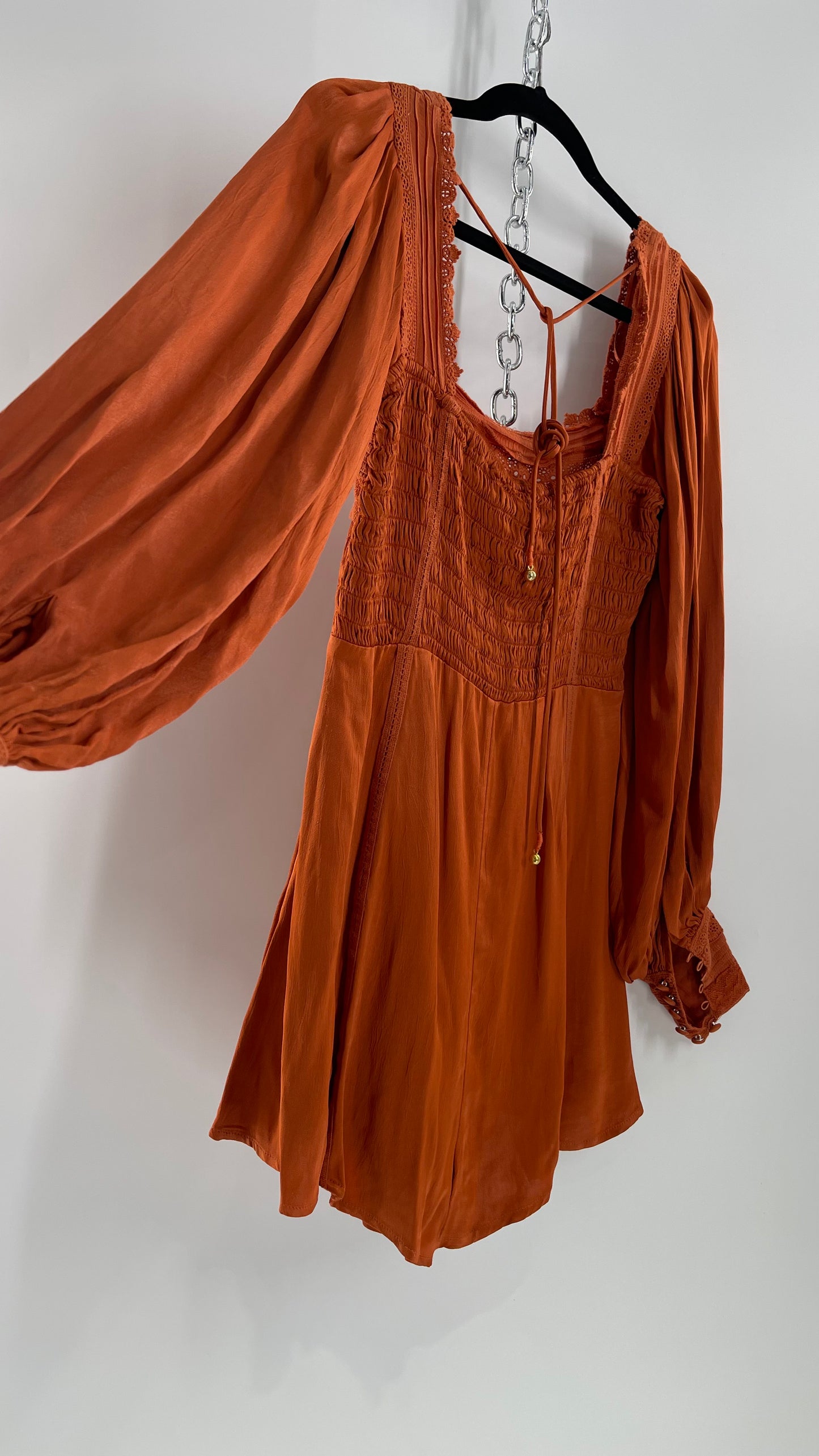 Free People Silky Orange Romper with Buttoned Sleeve Cuffs, Balloon Sleeves and Pleated Lace Bust (2)