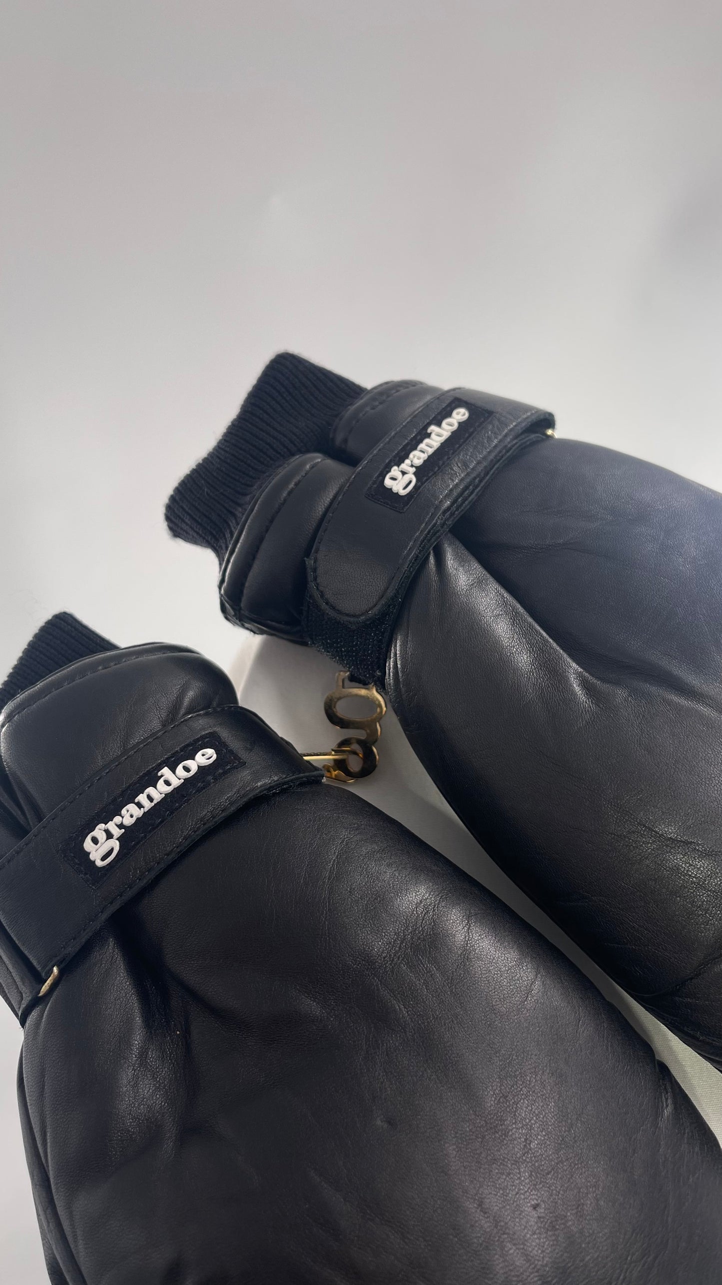 Grandoe Black Leather Mittens with Branding and Gold Logo Link