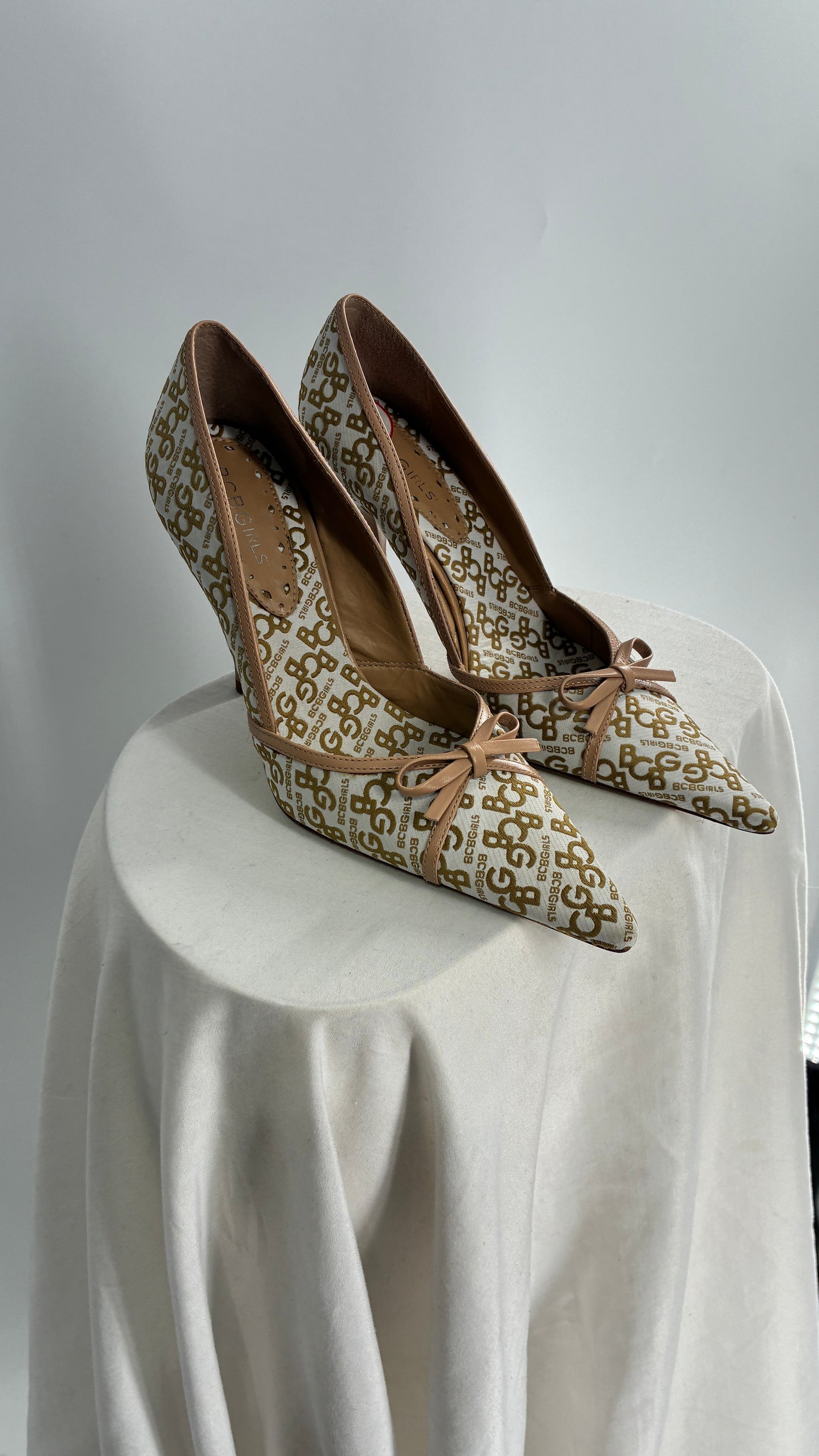 Vintage BCBG All Over Monogram Pointed Toe Heels with Leather Bows and Piping (5.5)