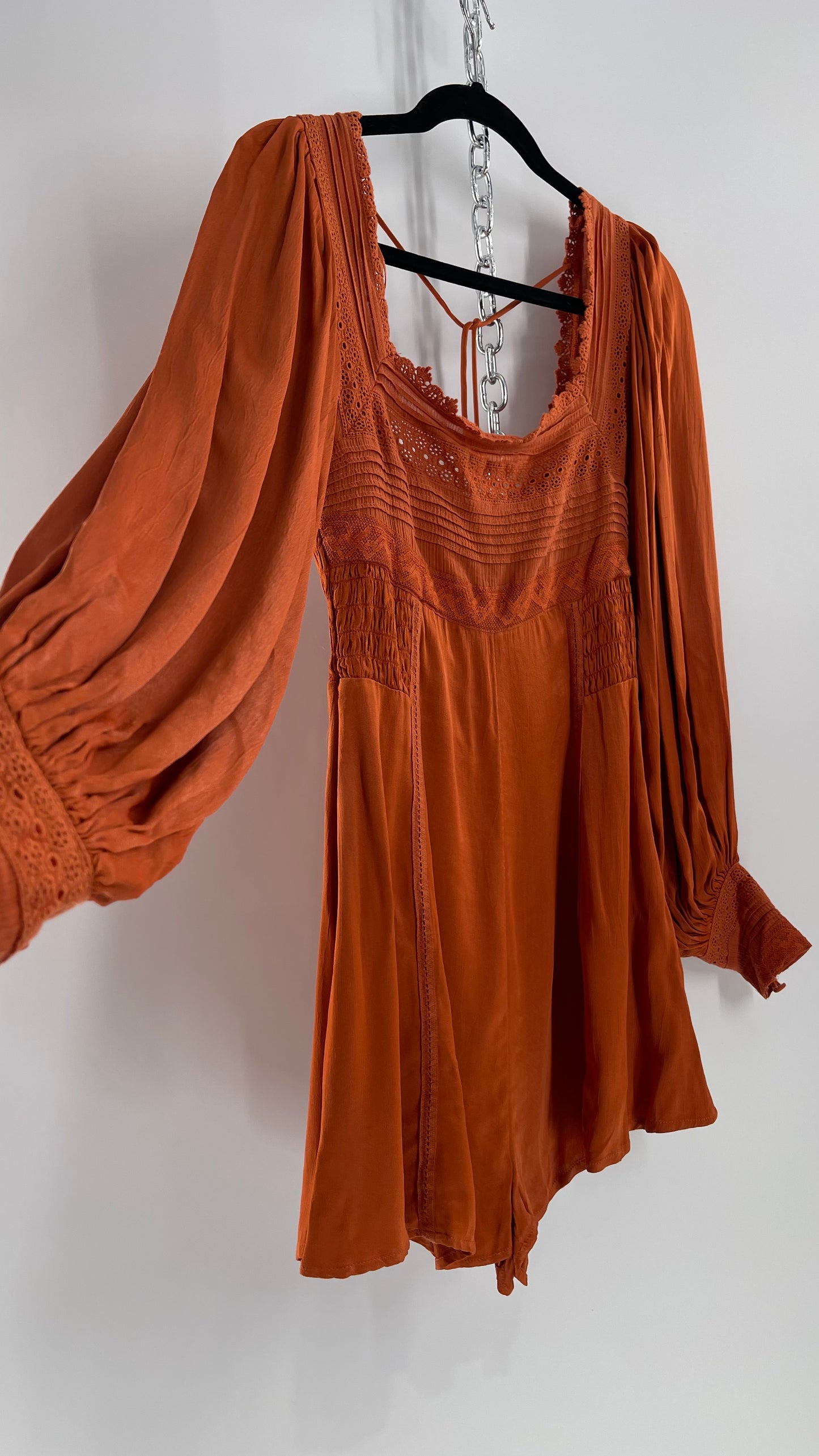 Free People Silky Orange Romper with Buttoned Sleeve Cuffs, Balloon Sleeves and Pleated Lace Bust (2)