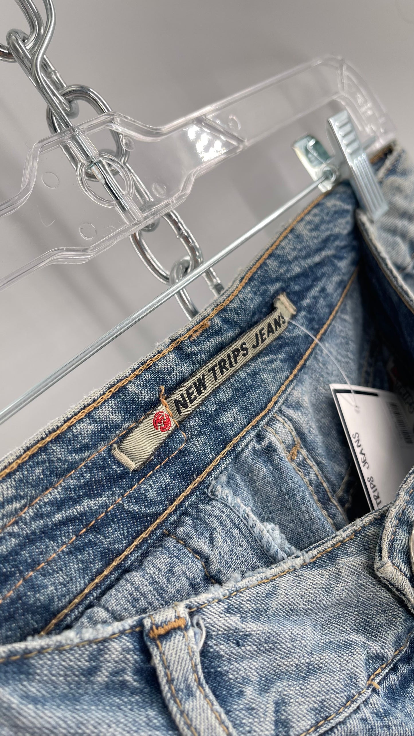 Vintage New Trips Light Wash Kick Flare Jeans with Zipper Hem Detail, V Waistline and Oversized Metal Buttons (40)