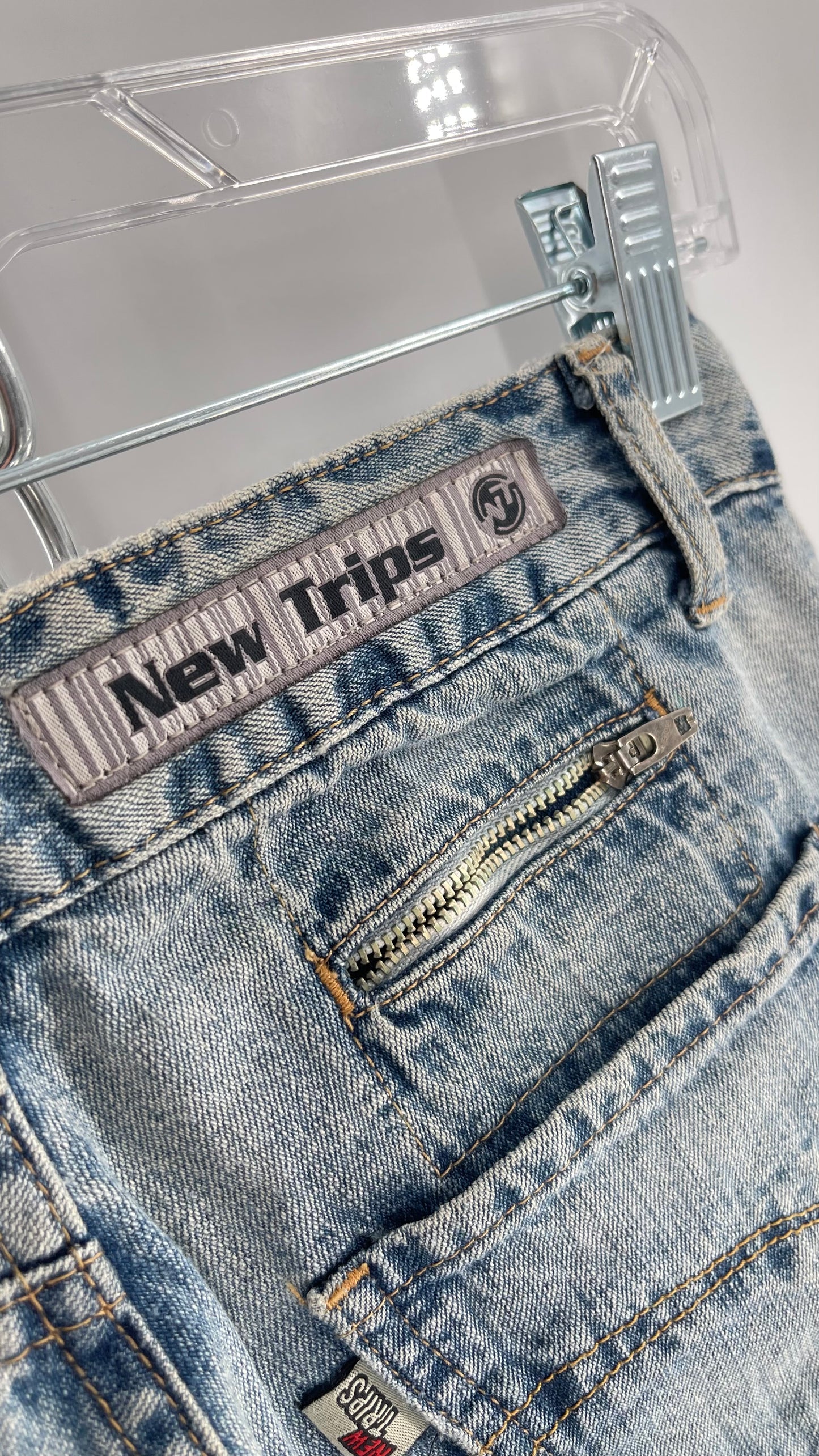 Vintage New Trips Light Wash Kick Flare Jeans with Zipper Hem Detail, V Waistline and Oversized Metal Buttons (40)