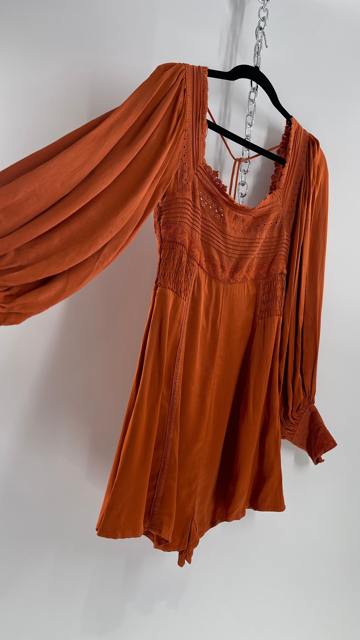 Free People Silky Orange Romper with Buttoned Sleeve Cuffs, Balloon Sleeves and Pleated Lace Bust (2)