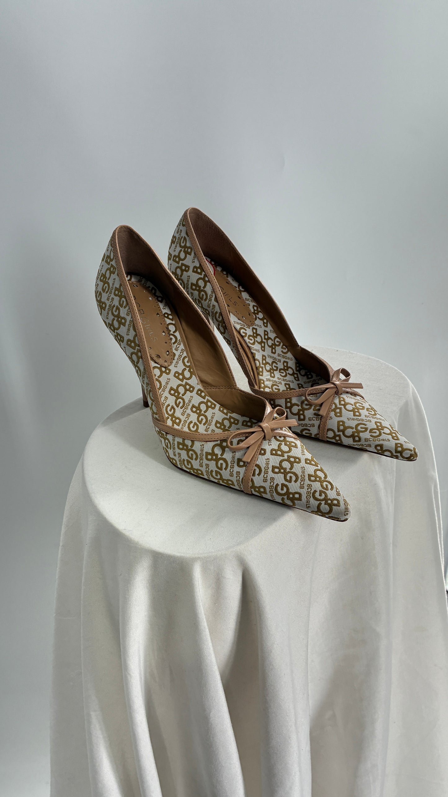 Vintage BCBG All Over Monogram Pointed Toe Heels with Leather Bows and Piping (5.5)