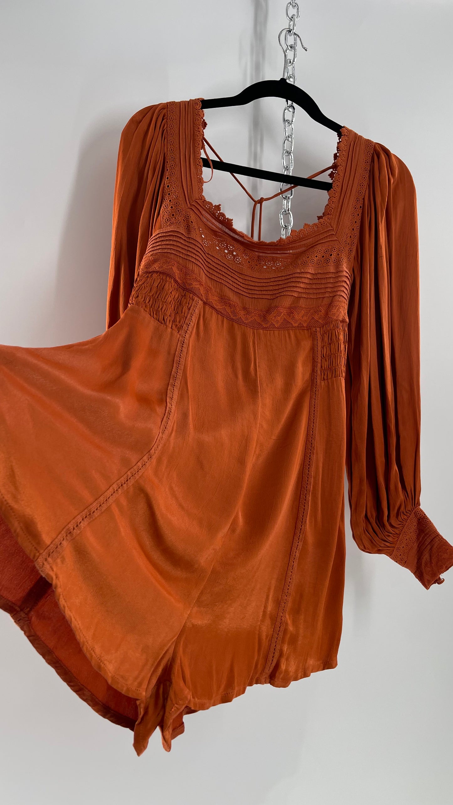 Free People Silky Orange Romper with Buttoned Sleeve Cuffs, Balloon Sleeves and Pleated Lace Bust (2)