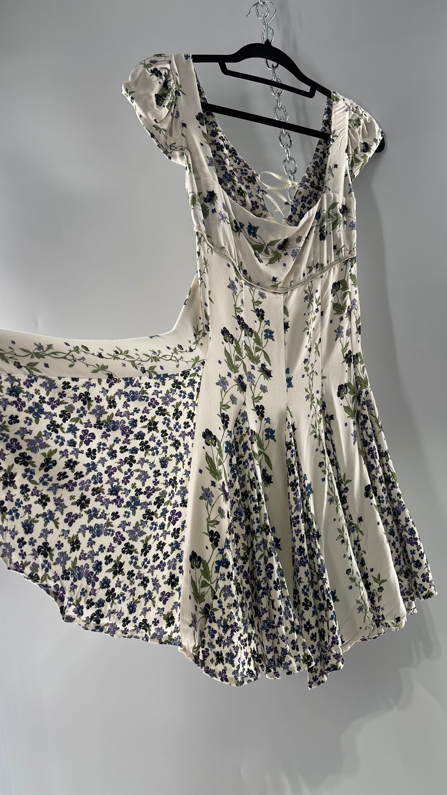 Free People Ivory Mini Dress with Violet Floral Pattern, Cap Sleeves and Lace Up Open Back (M)