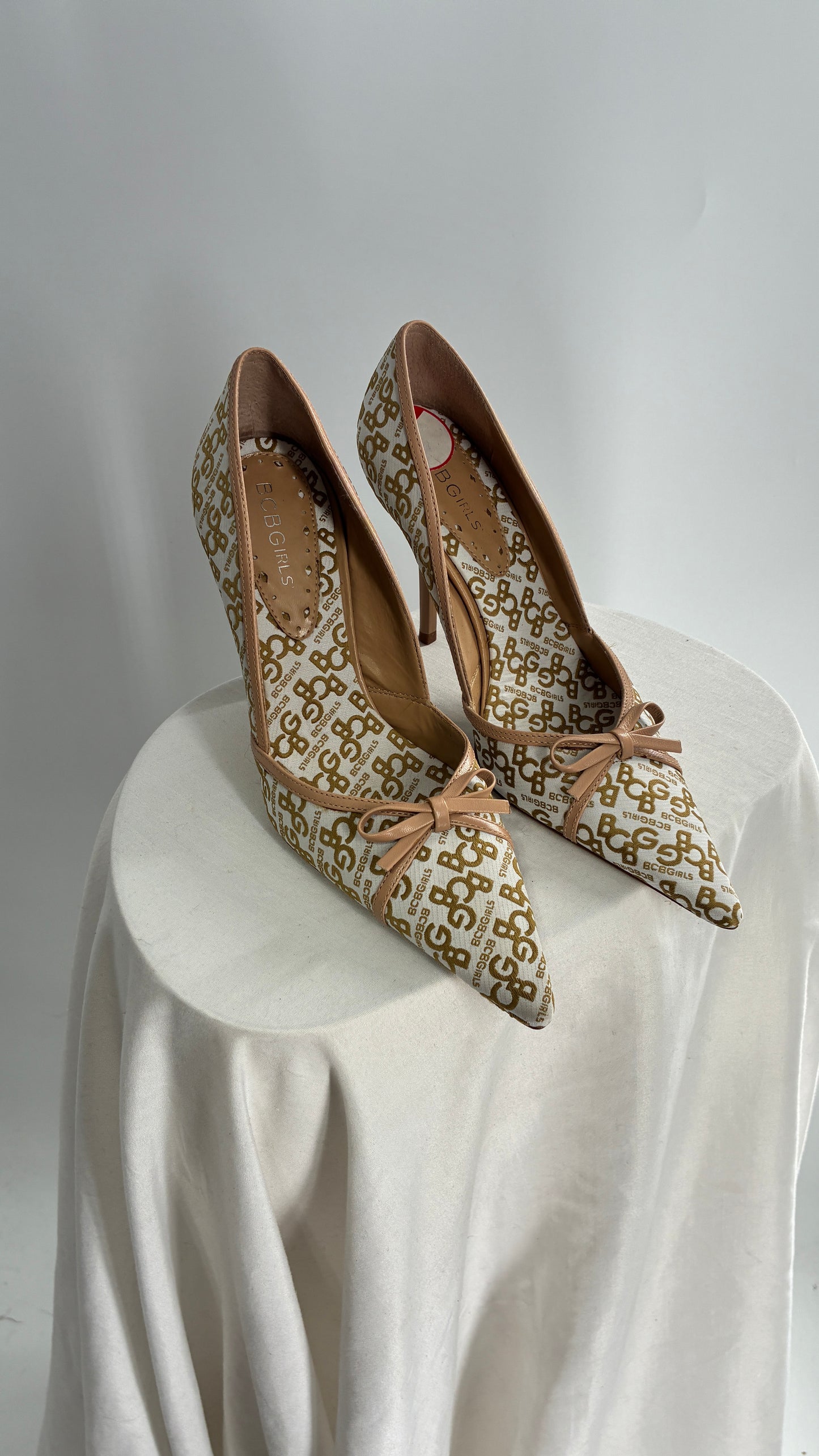 Vintage BCBG All Over Monogram Pointed Toe Heels with Leather Bows and Piping (5.5)
