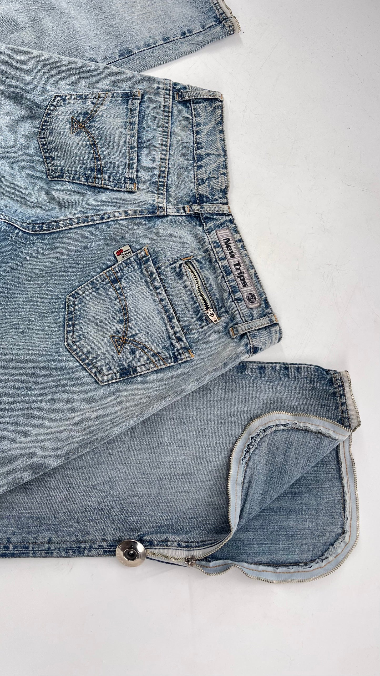 Vintage New Trips Light Wash Kick Flare Jeans with Zipper Hem Detail, V Waistline and Oversized Metal Buttons (40)
