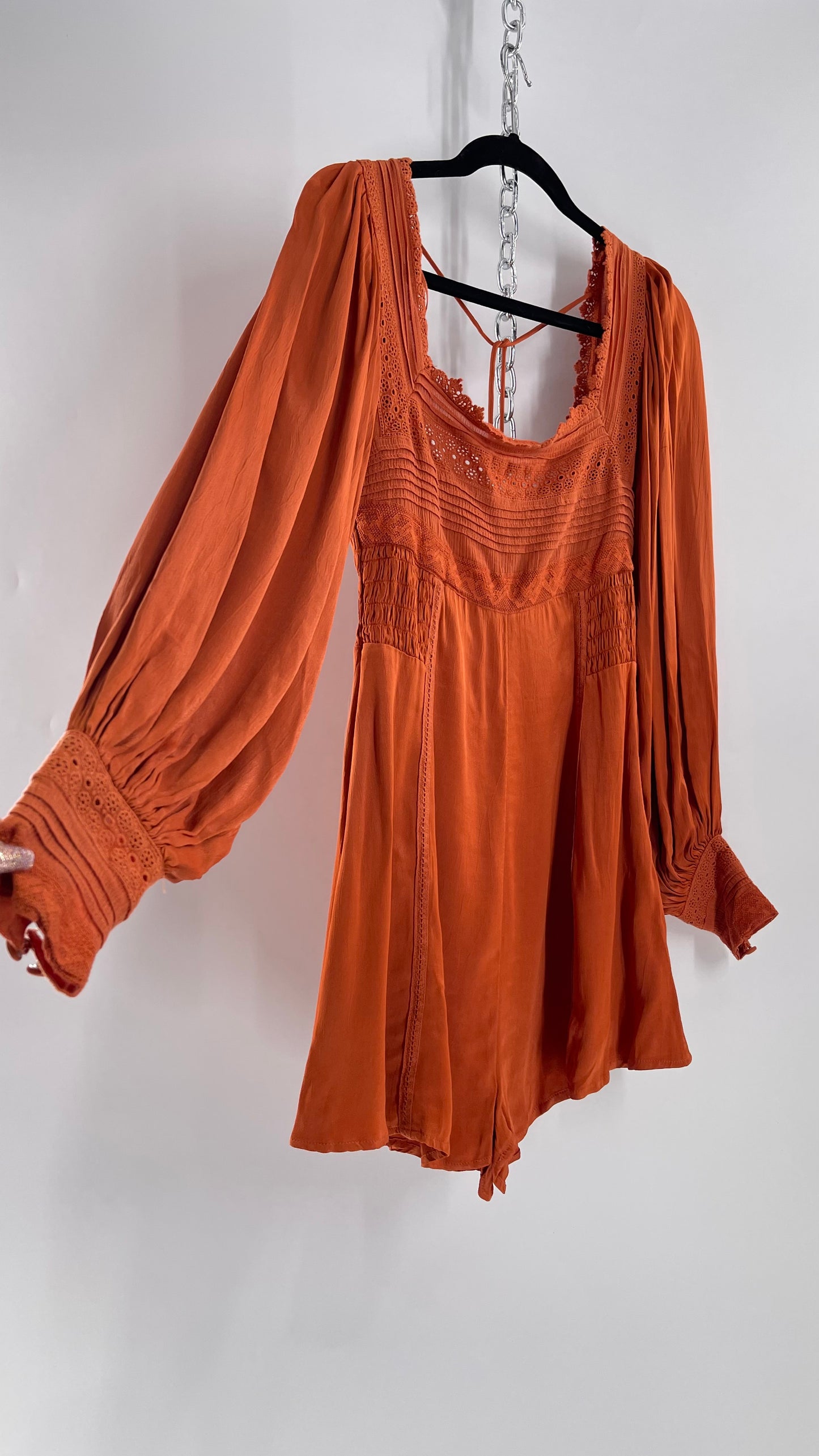 Free People Silky Orange Romper with Buttoned Sleeve Cuffs, Balloon Sleeves and Pleated Lace Bust (2)