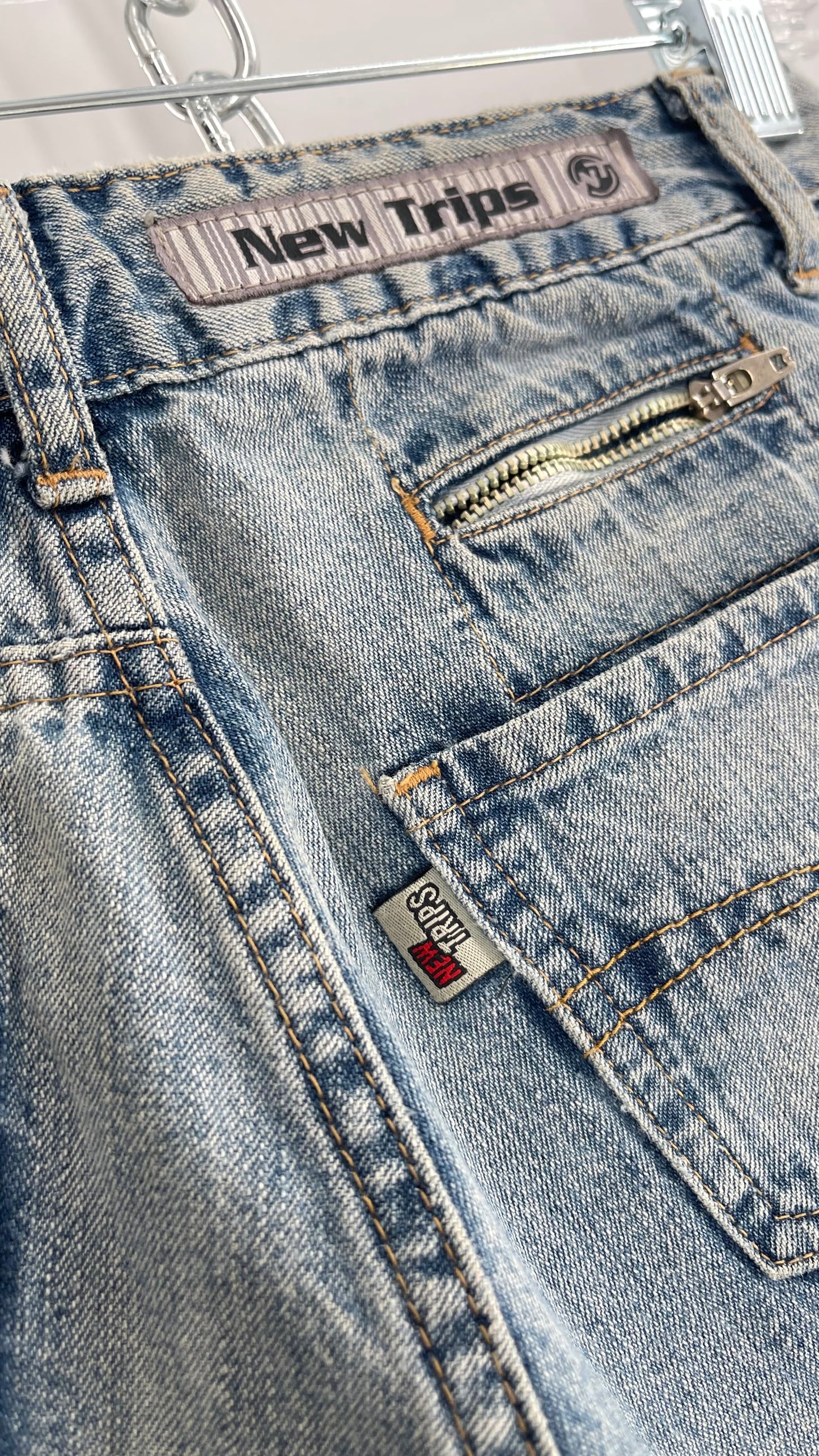 Vintage New Trips Light Wash Kick Flare Jeans with Zipper Hem Detail, V Waistline and Oversized Metal Buttons (40)