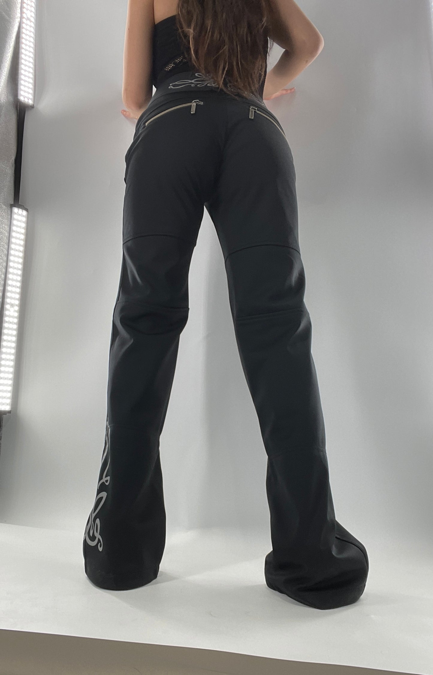 Vintage Athleta Flare 100% Nylon Thick Stretchy Black Pants with Side Clasps, Low Rise, Graphic on Back and Side of Leg (4)