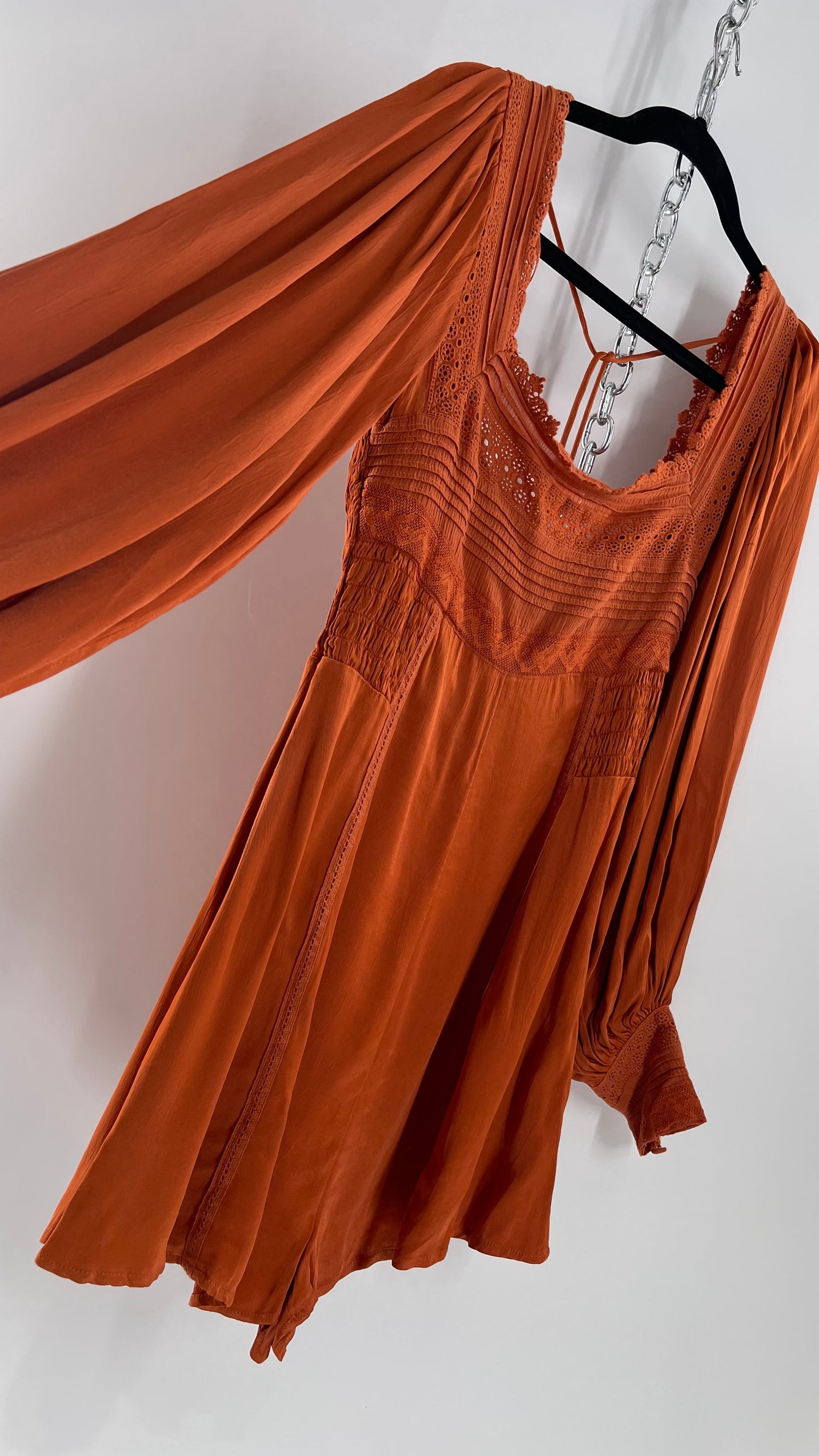 Free People Silky Orange Romper with Buttoned Sleeve Cuffs, Balloon Sleeves and Pleated Lace Bust (2)