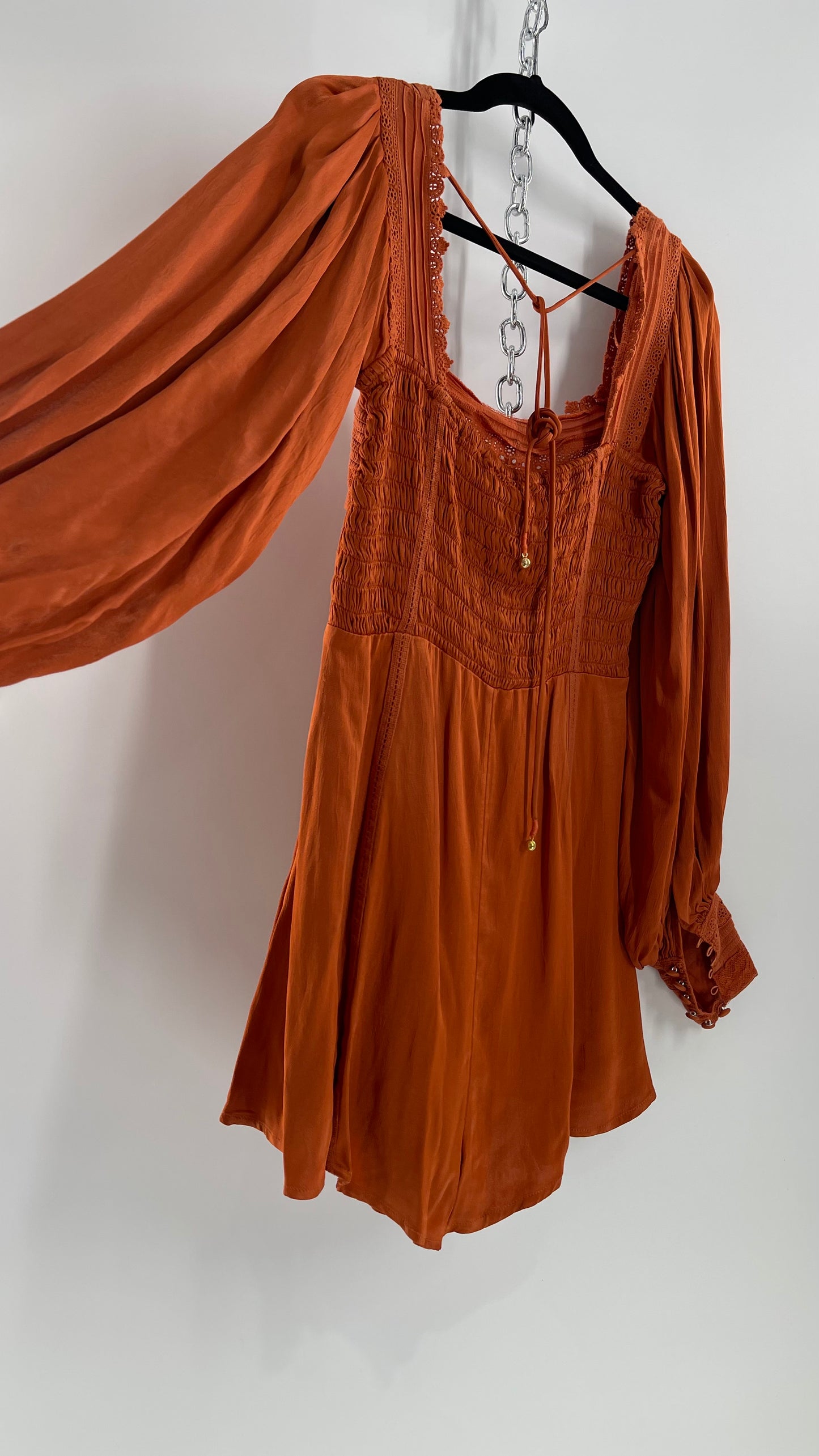 Free People Silky Orange Romper with Buttoned Sleeve Cuffs, Balloon Sleeves and Pleated Lace Bust (2)