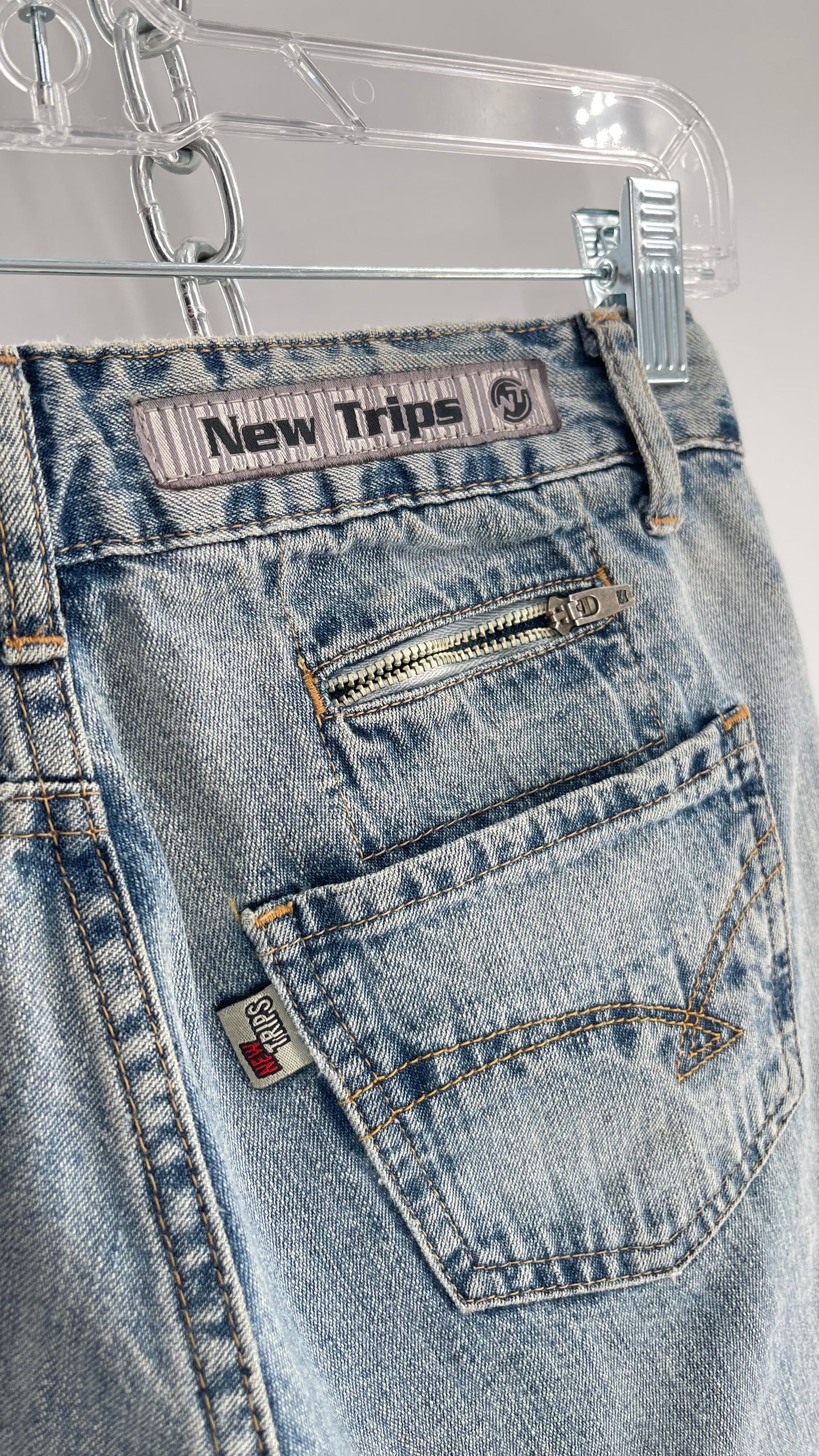 Vintage New Trips Light Wash Kick Flare Jeans with Zipper Hem Detail, V Waistline and Oversized Metal Buttons (40)