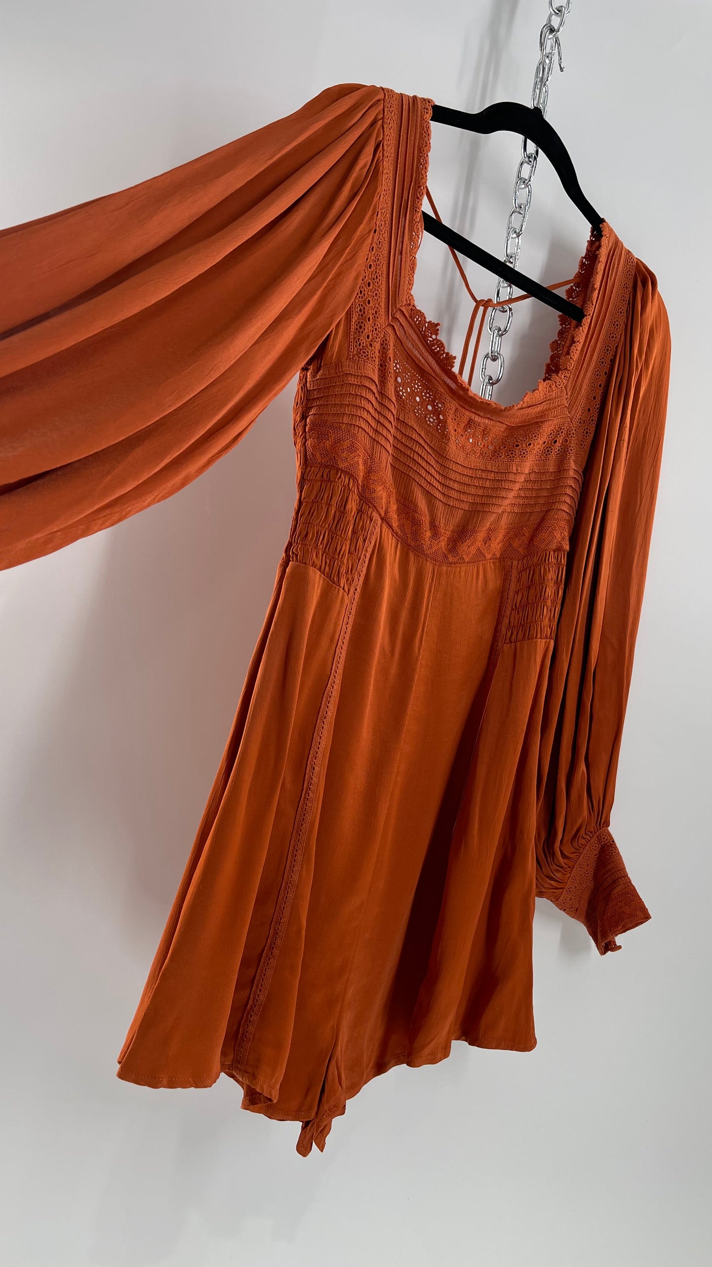 Free People Silky Orange Romper with Buttoned Sleeve Cuffs, Balloon Sleeves and Pleated Lace Bust (2)