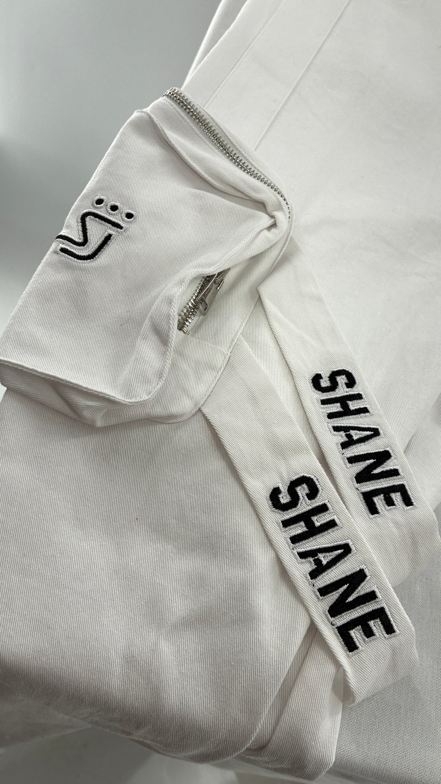 Designer SHANE JUSTIN White Stacked Extendo Cargo Pants with Embroidered Logo Pants and Tags Attached (Small)
